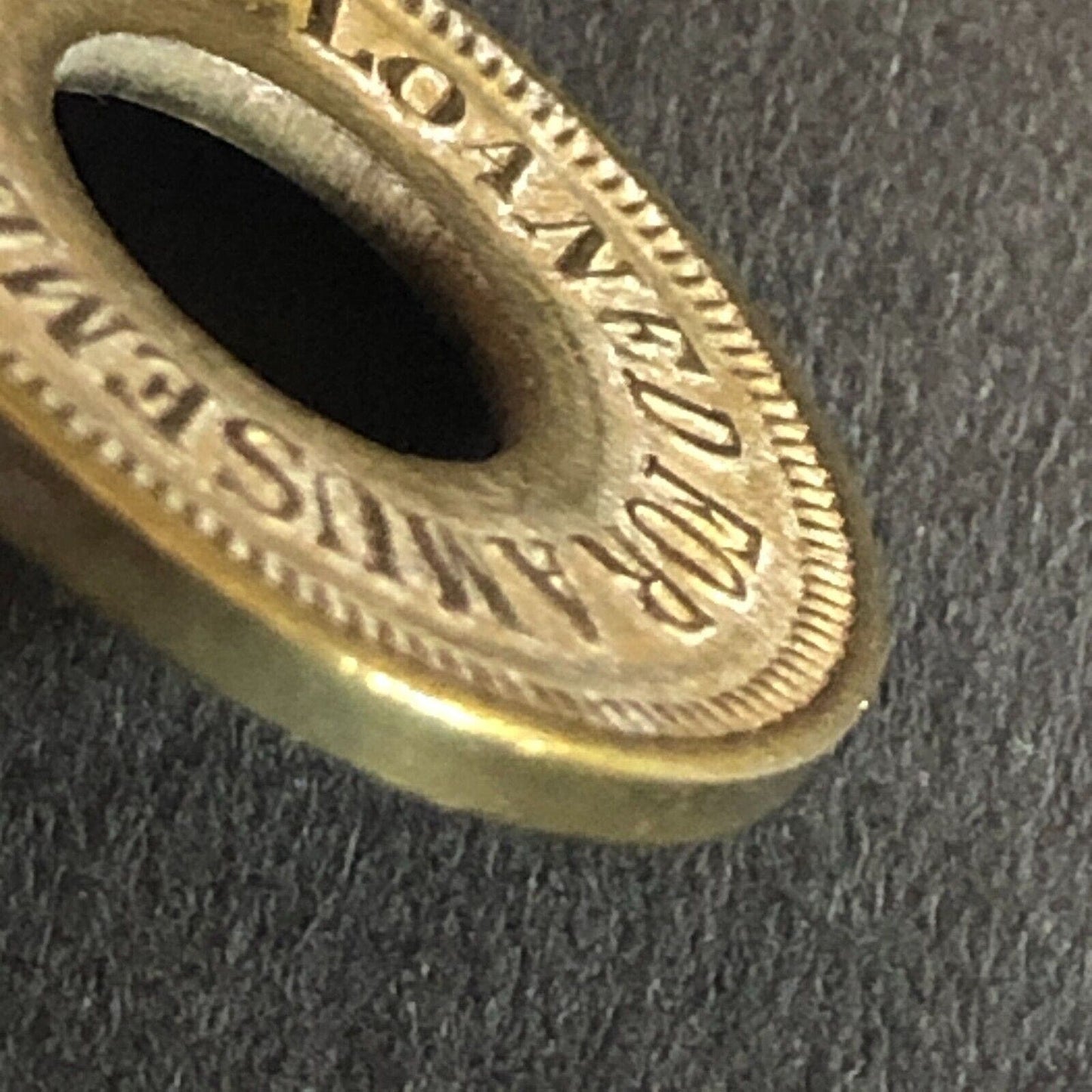 "O.K. Vender" Loaned for Amusement Only Brass Donut Game Token Star 21mm