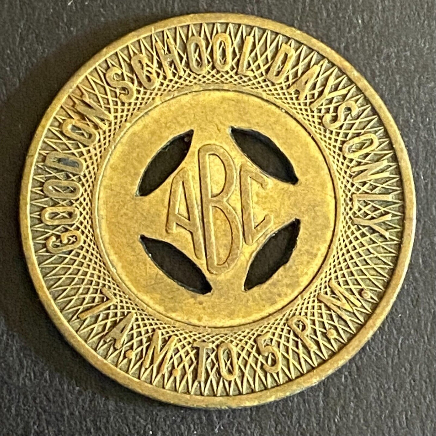 Albuquerque Bus Co. "Good on School Days Only" Transit Token - 23mm (1)