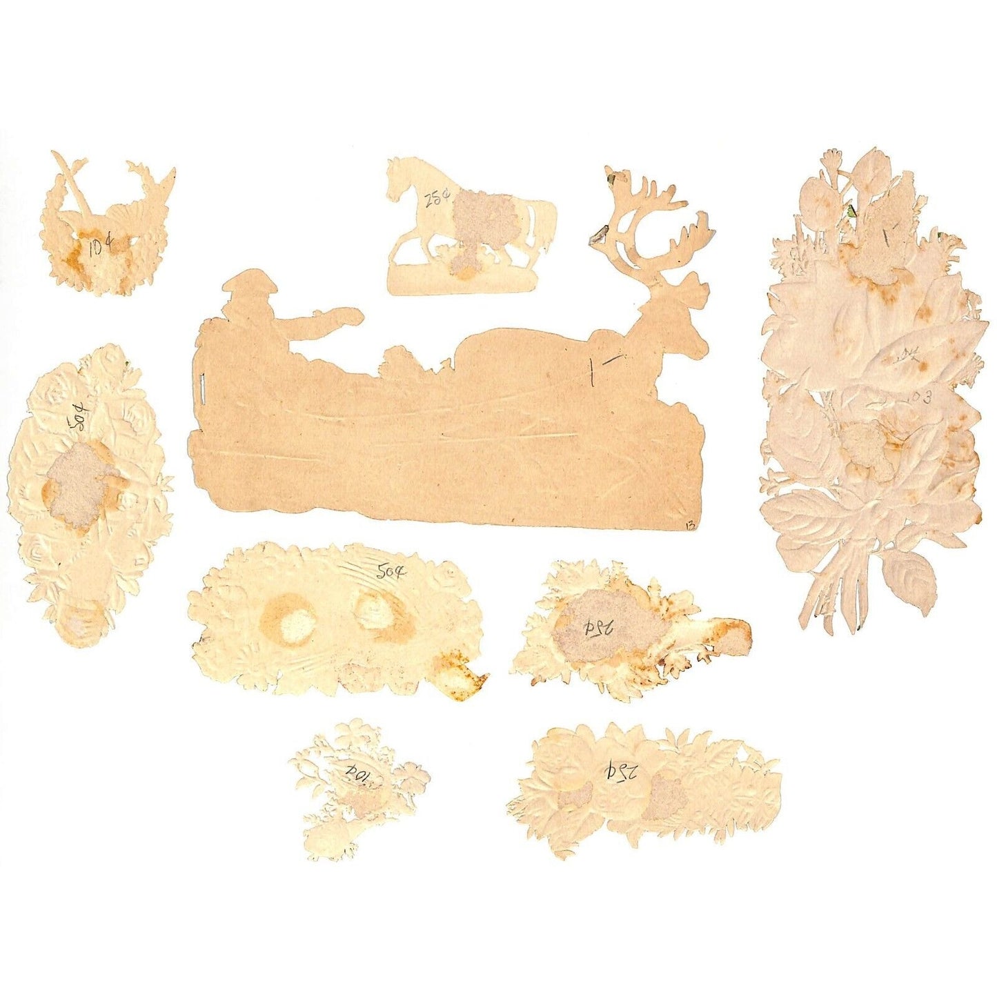Victorian Scrap Die Cut Embossed Floral incl. Reindeer Pulls Man on Sled 9 pcs.