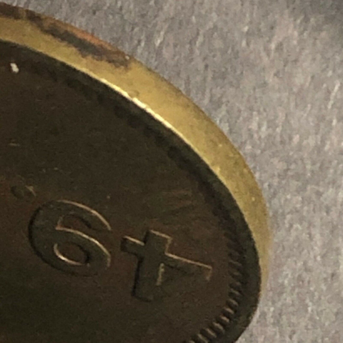 Brass 21.30mm British American Novelty Co. "Rock and Play" Token - Fauver Coll.