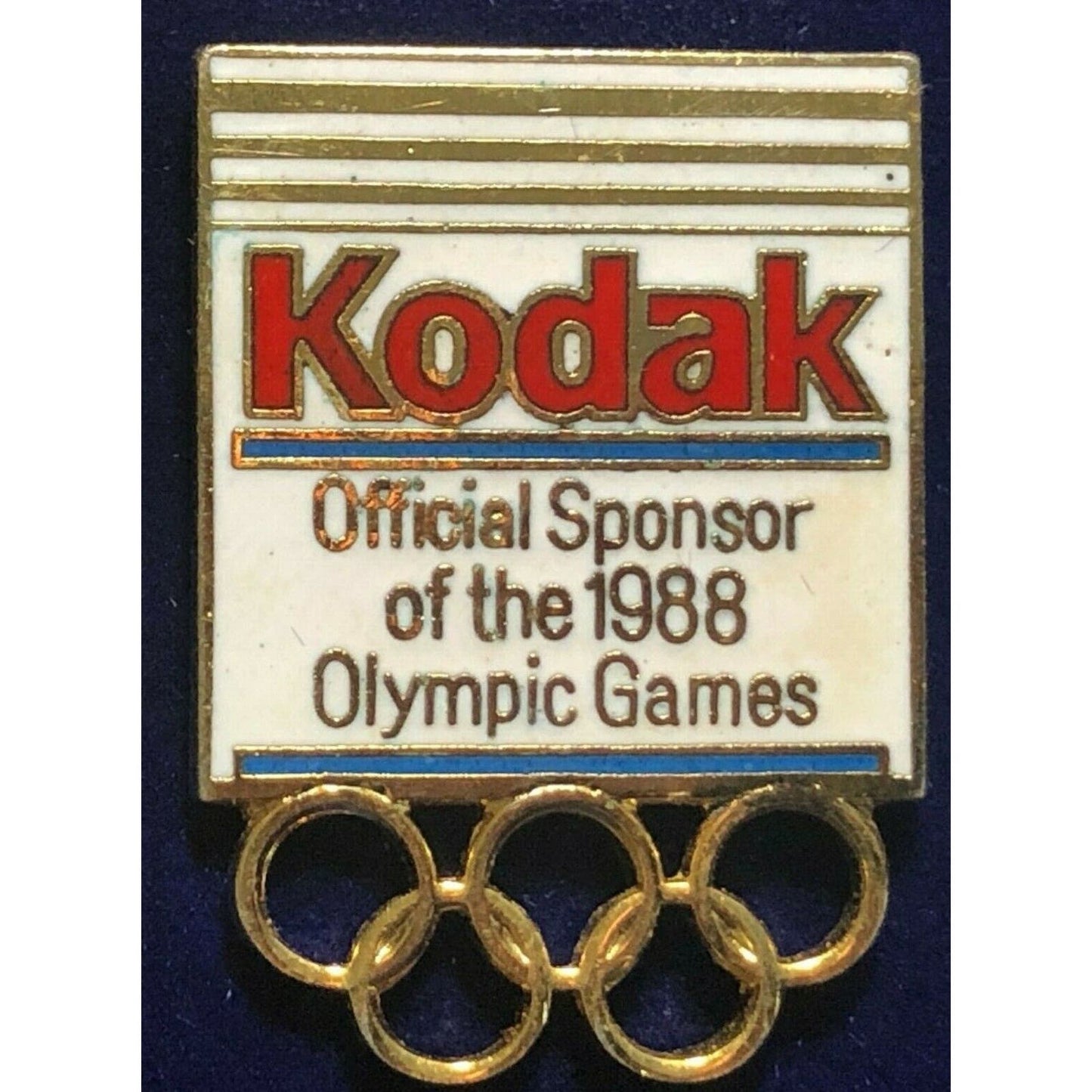 Vintage Kodak Lapel Hat Pin 1988 Olympics Official Sponsor Rings (White)