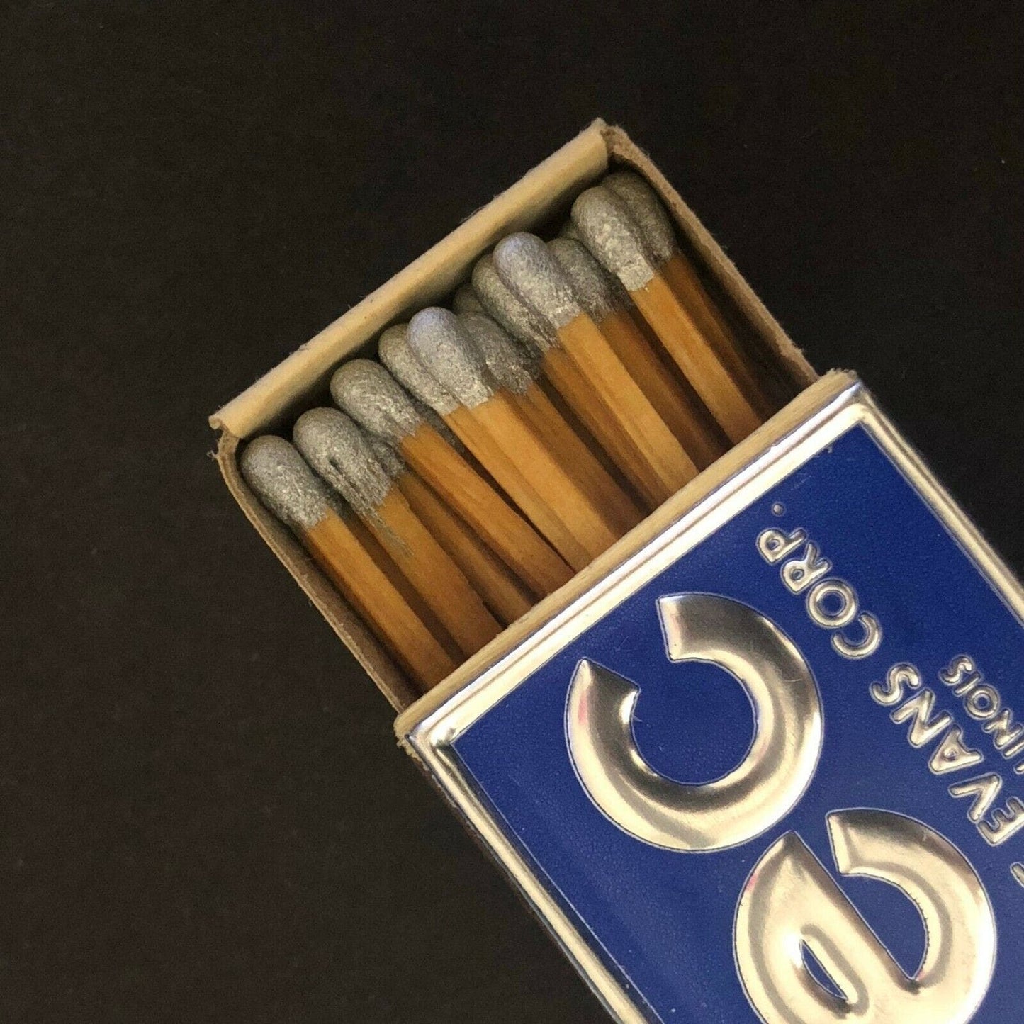 c60's Moline, IL Foil Wooden Matchbox / Matchbook "The George Evans Corp."