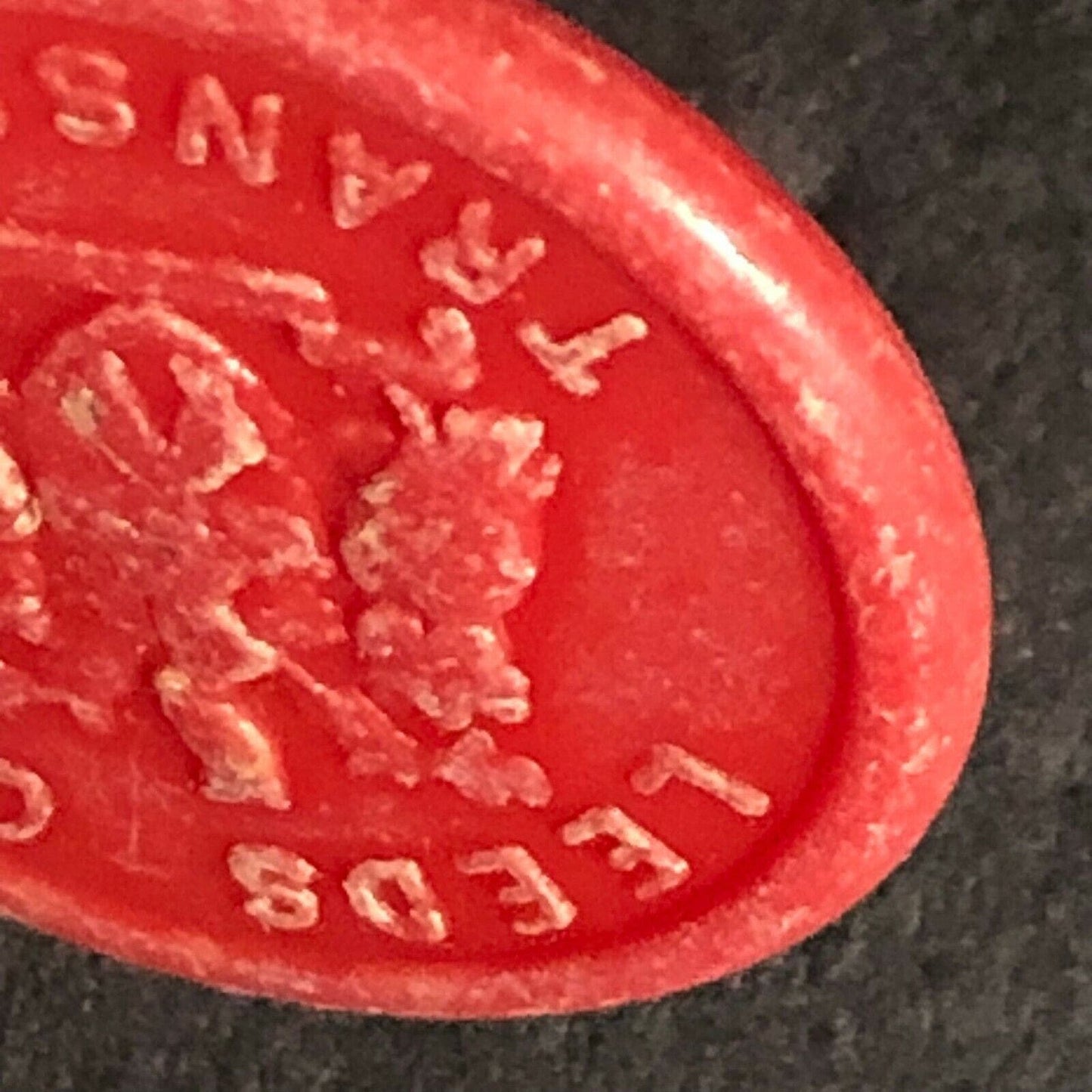 Leeds City Transport England Plastic Transit Token Red 2D 21mm c50's-60's