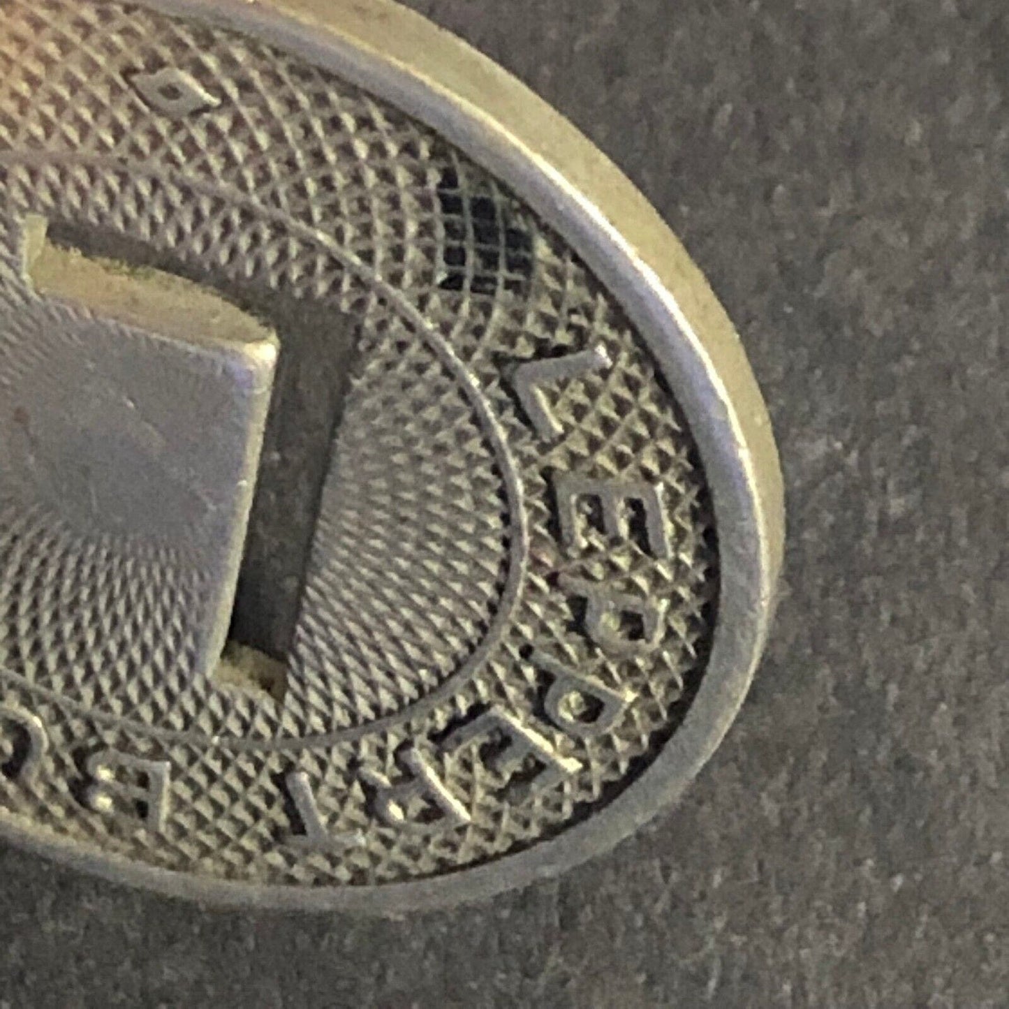 Leppert Bus Lines (Columbia, IN) G/F One Fare WM Token 23mm "L" Cutout