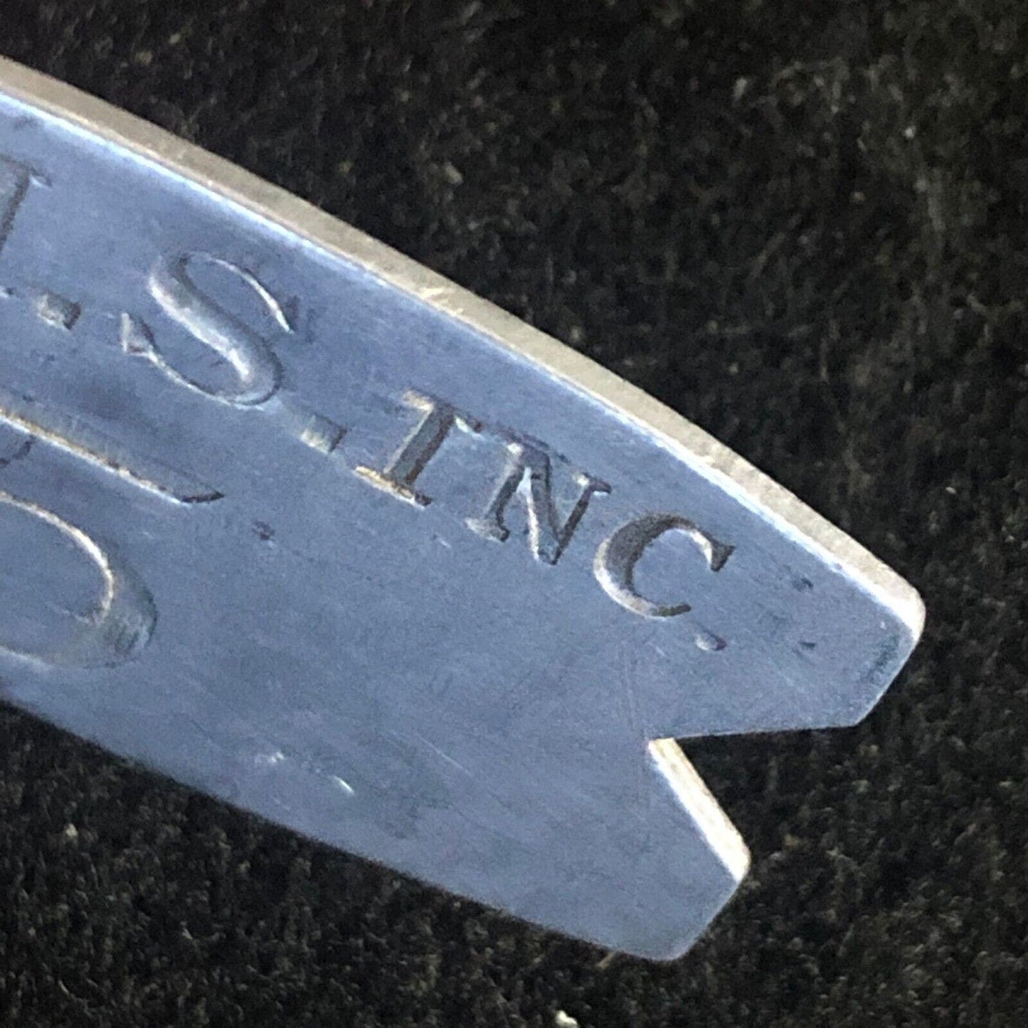 H.M.S. Inc. 5 (H. M. Stevens - Churchill Downs) Alum. "Fishtail" Token 22mm x 38