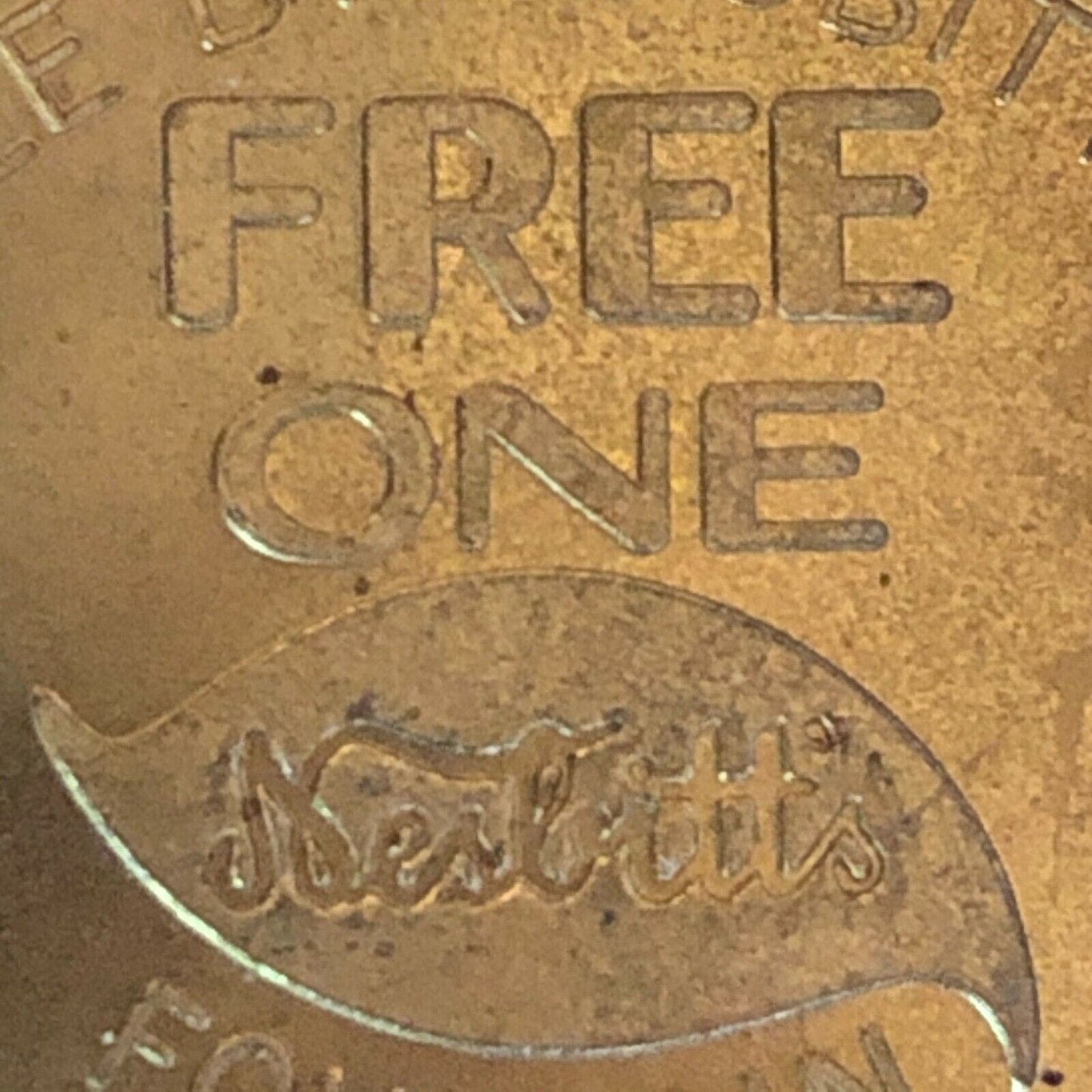 39.50mm Nesbitts "Free Fountain Orange Drink w/ Purchase Of One Hamburger" Token