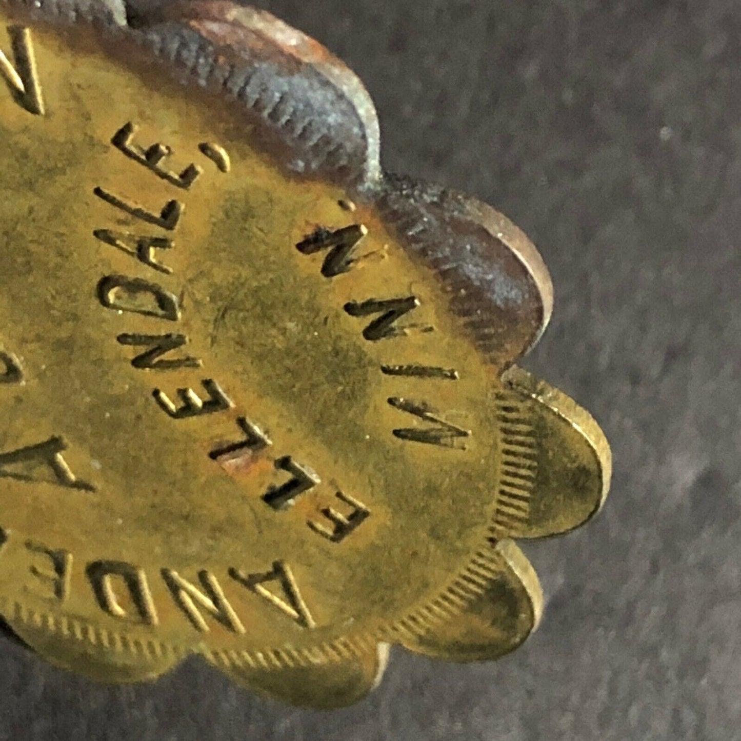 Anderson & Nelson Ellendale, Minn G/F $1 Brass Token 38mm Scalloped c1931-41