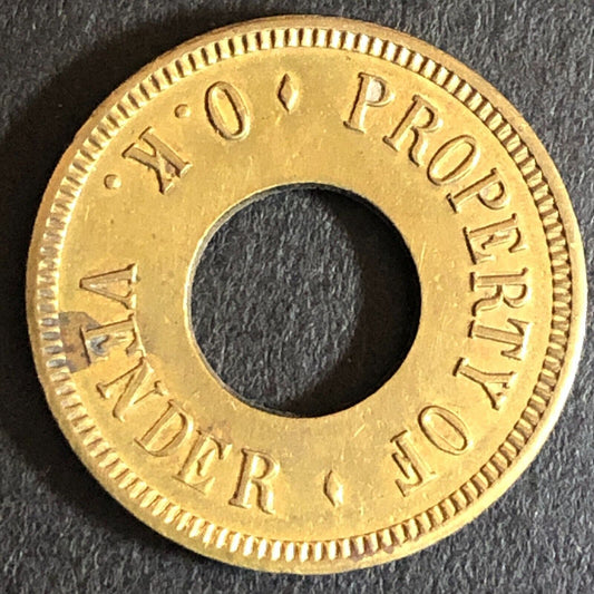 "O.K. Vender" Loaned for Amusement Only Brass Donut Game Token Star 21mm