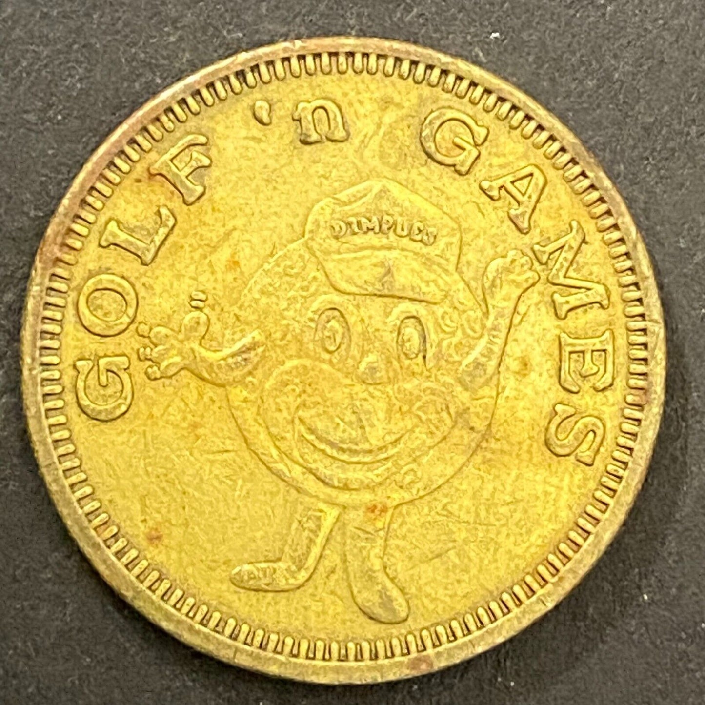 Golf 'n Games No Cash Value Arcade Token Dimples Golf Ball Mascot 22mm (#1)