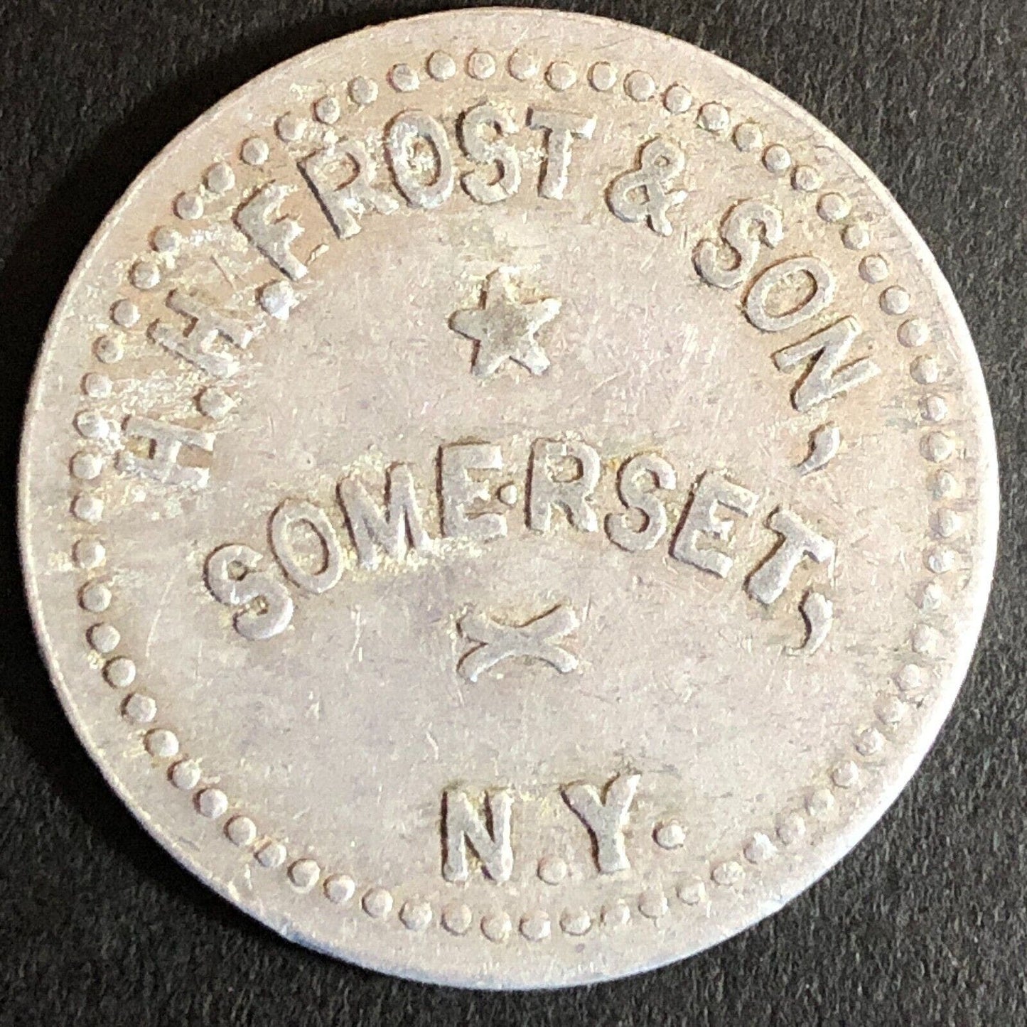 H.H. Frost & Son Somerset, NY G/F 25c Alum Trade Token c1920's-30's 29mm