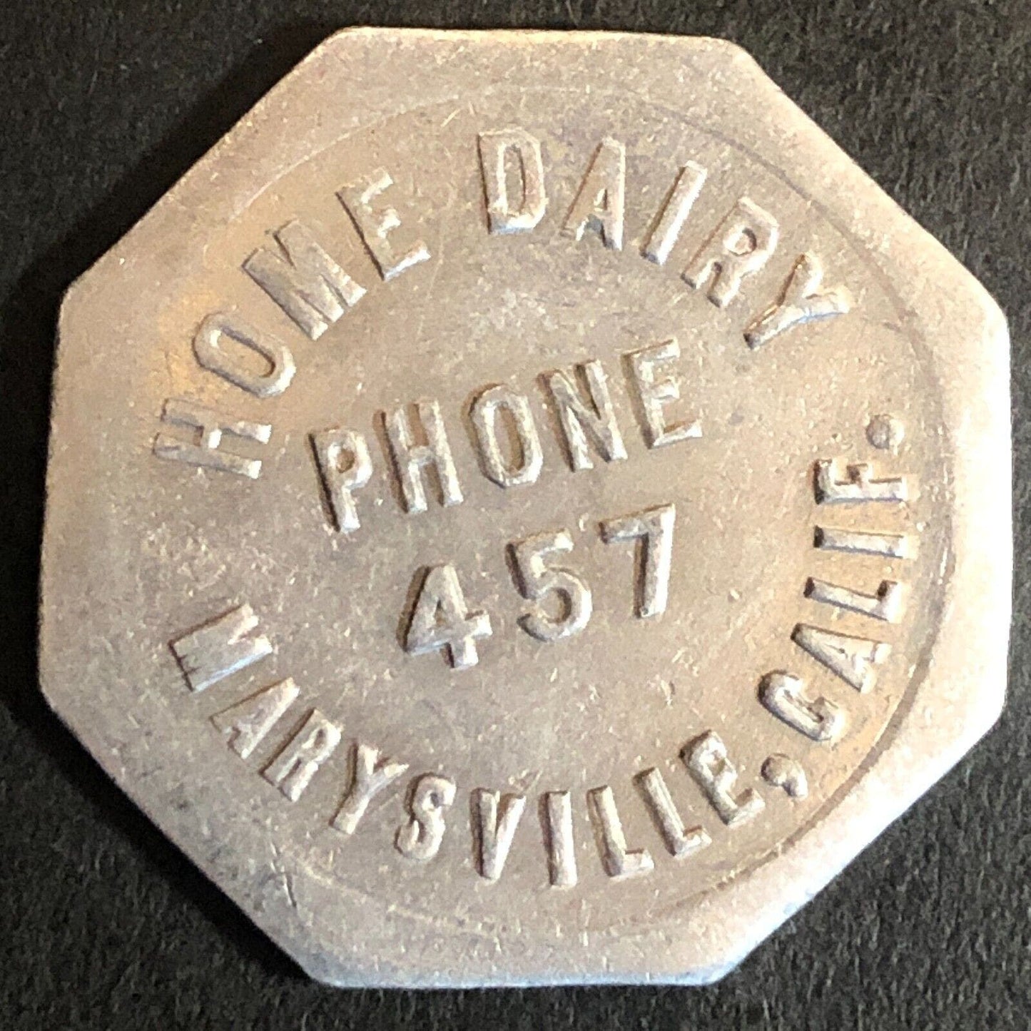Home Dairy Marysville, CA Alum Hex Trade Token G/F One Pint - 25.6mm c1920's-40
