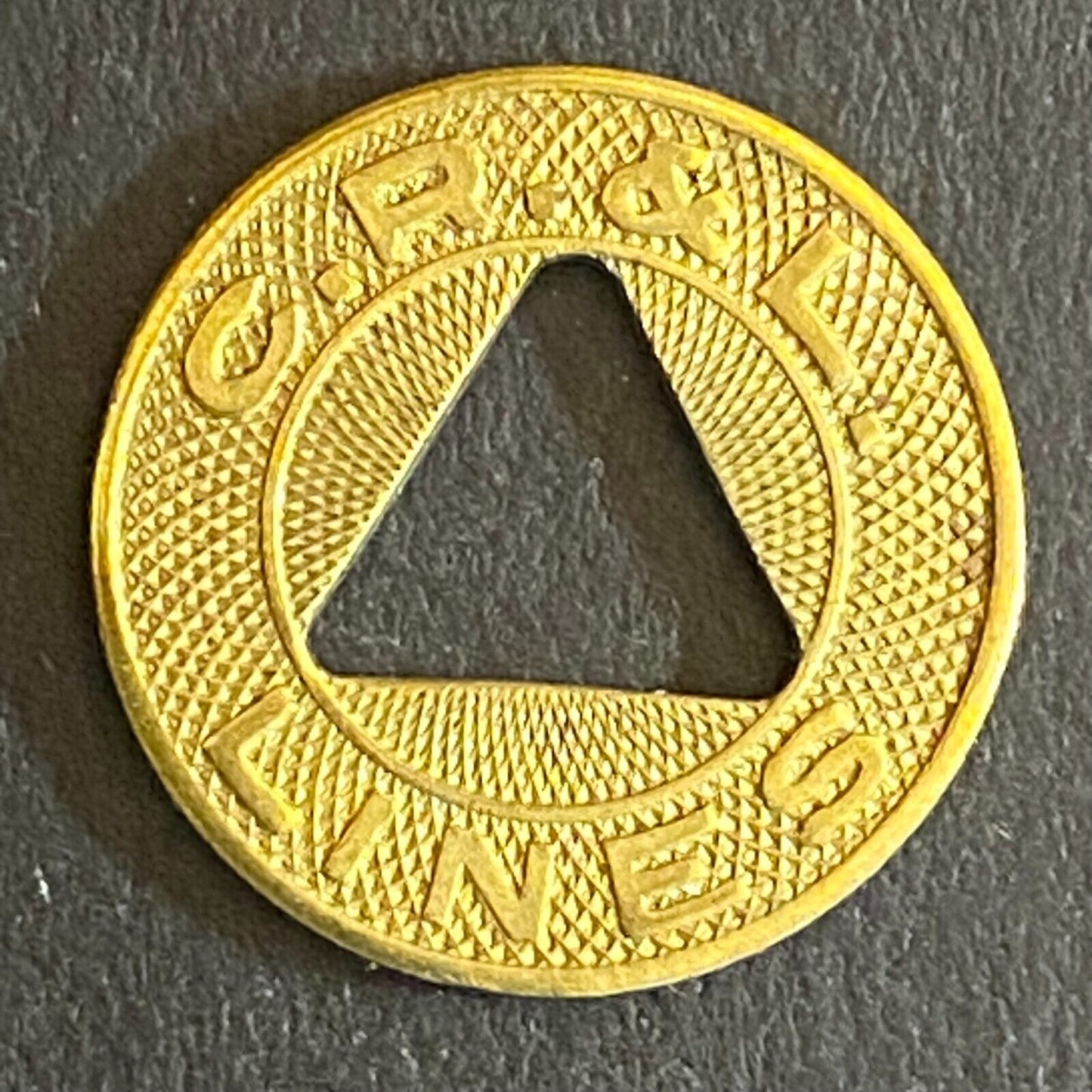 C.R. & L. Lines (New Britain, CT) G/F One Fare Transit Token w/ Triangle 16mm