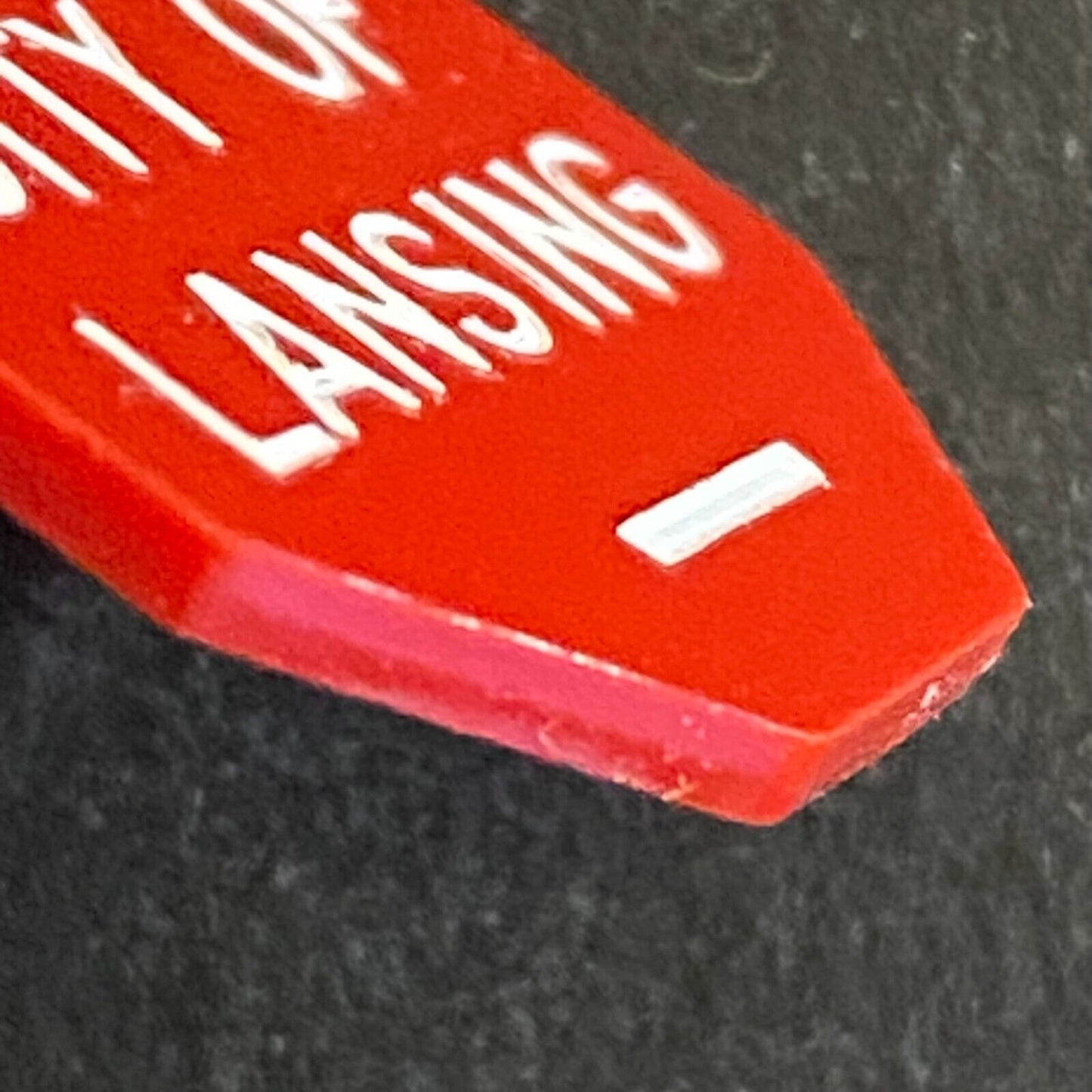 "City of Lansing" Red Plastic c1970's Transit ?* Token 23mm