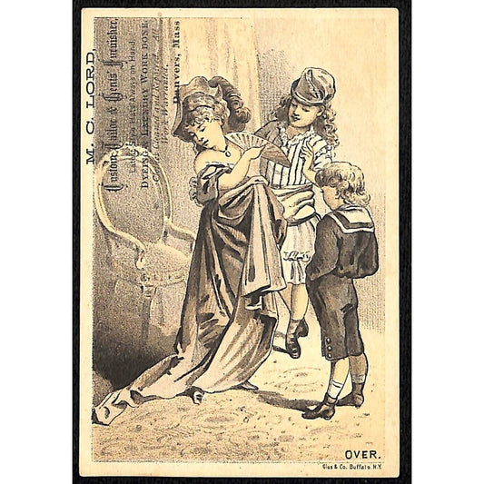 M. C. Lord Tailor Danvers MA Victorian Trade Card Girl Trying on Dress