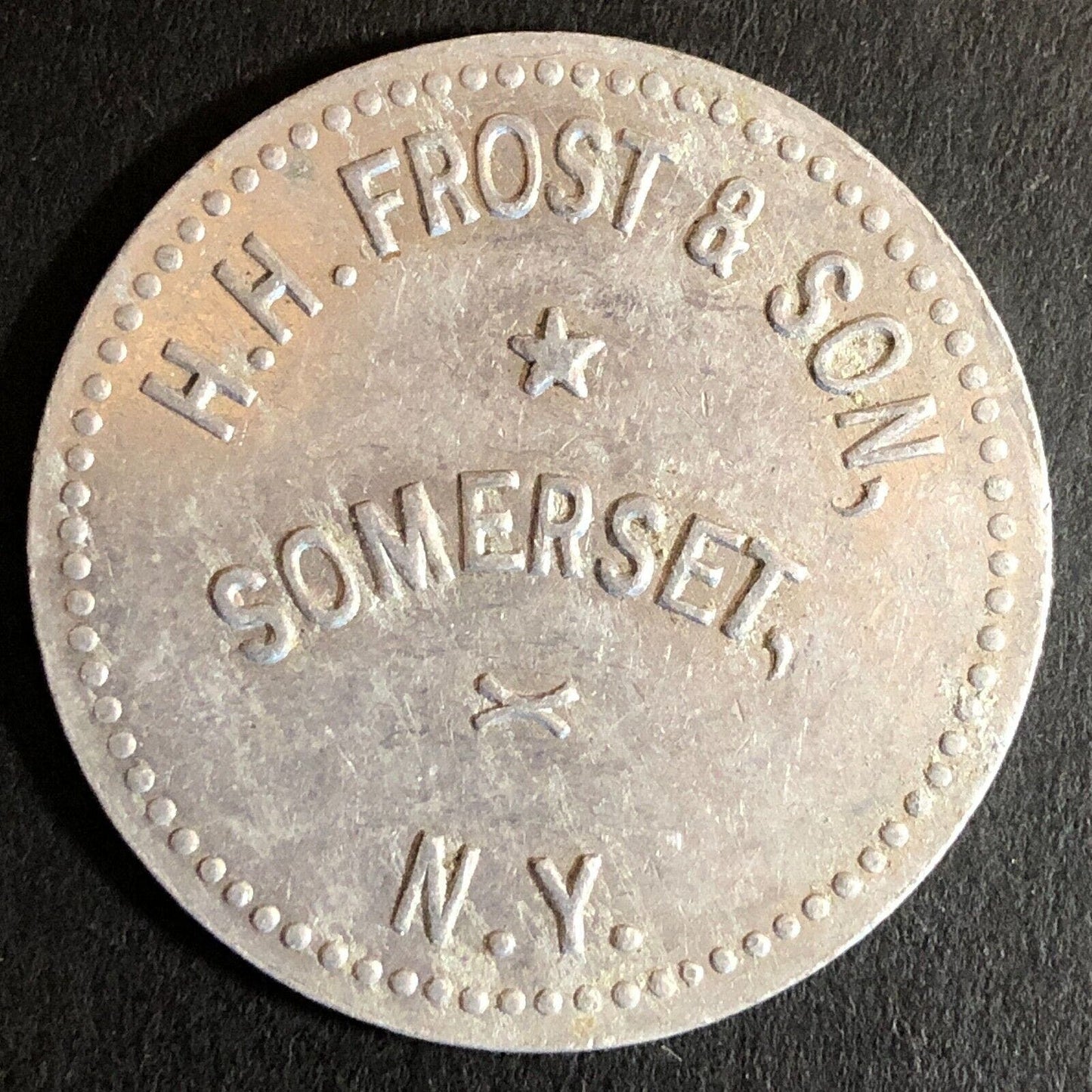 H.H. Frost & Son Somerset, NY G/F $1 Alum Trade Token c1920's-30's - 35mm