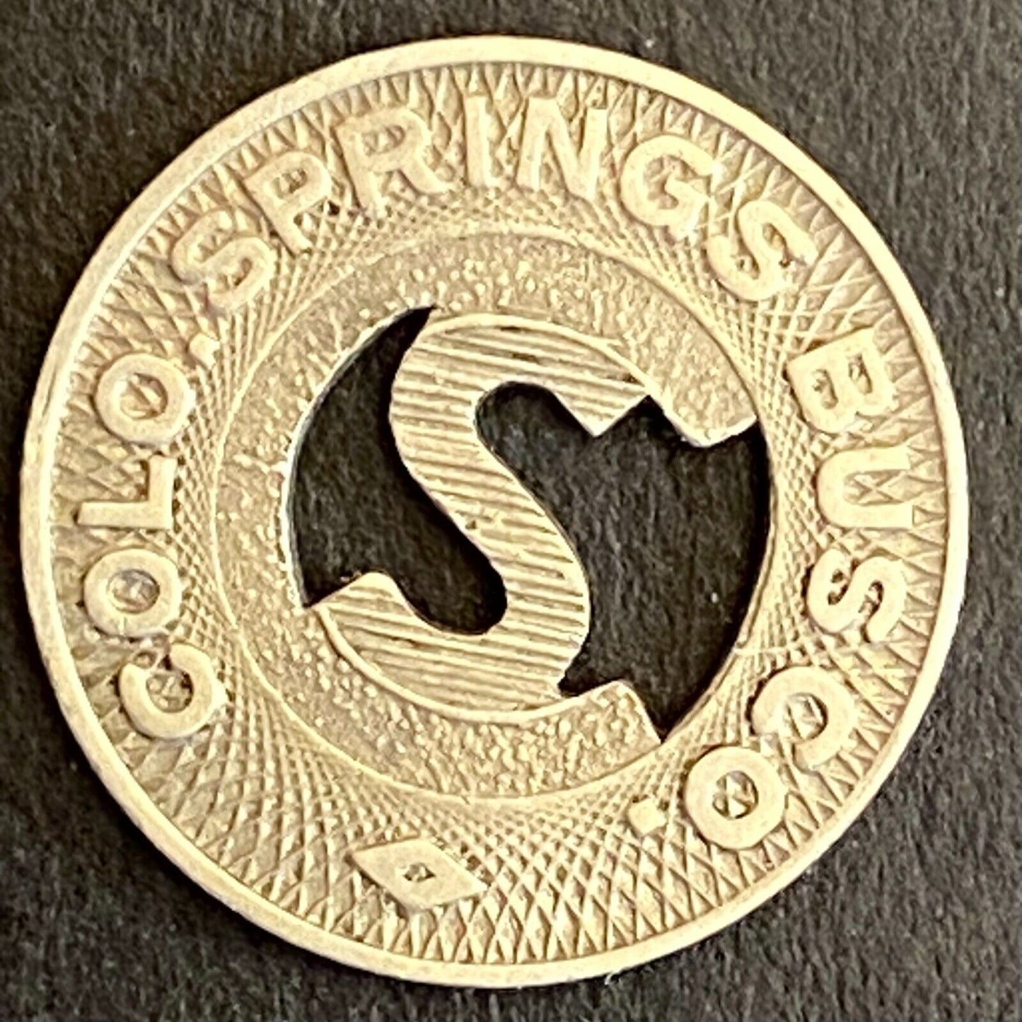 Colo. Springs Bus Co. G/F One Fare Transit Token 16mm (#4)