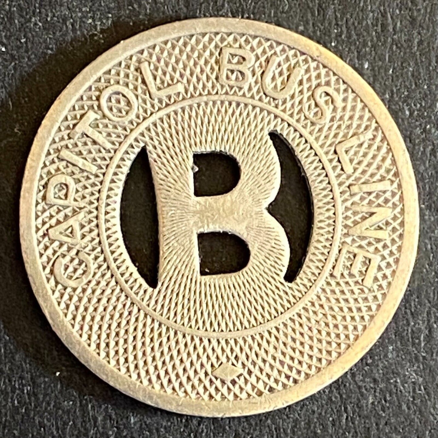 Capitol Bus Line (Bismarck, ND) WM G/F One Bus Fare Transit Token -- 20mm