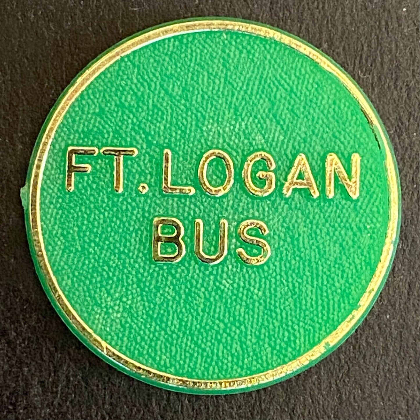 Ft. Logan Bus Englewood, CO Plastic Transit Token 23mm (#5)