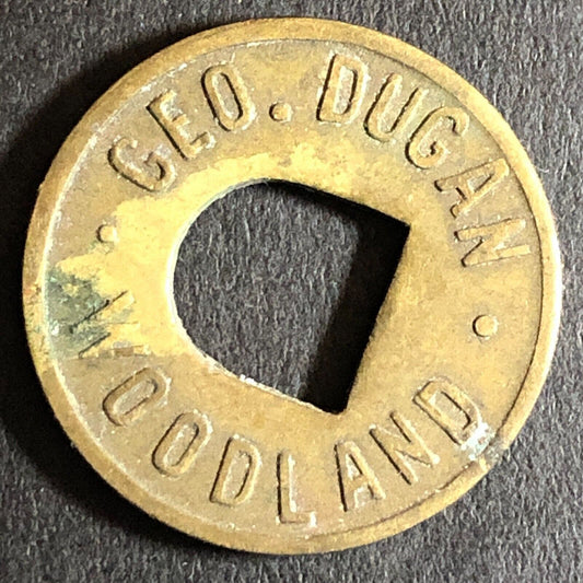 Geo. Dugan Woodland (CA Cigars Billiards) G/F 5c Trade Token c1920s Brass 21mm