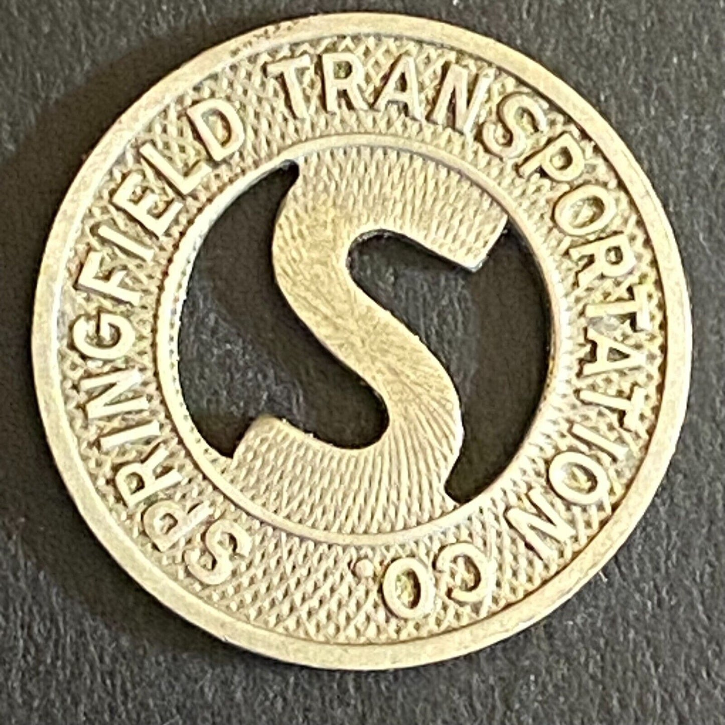 Springfield Transportation Co. G/F Full Fare Transit Token 16mm Hanging "S"