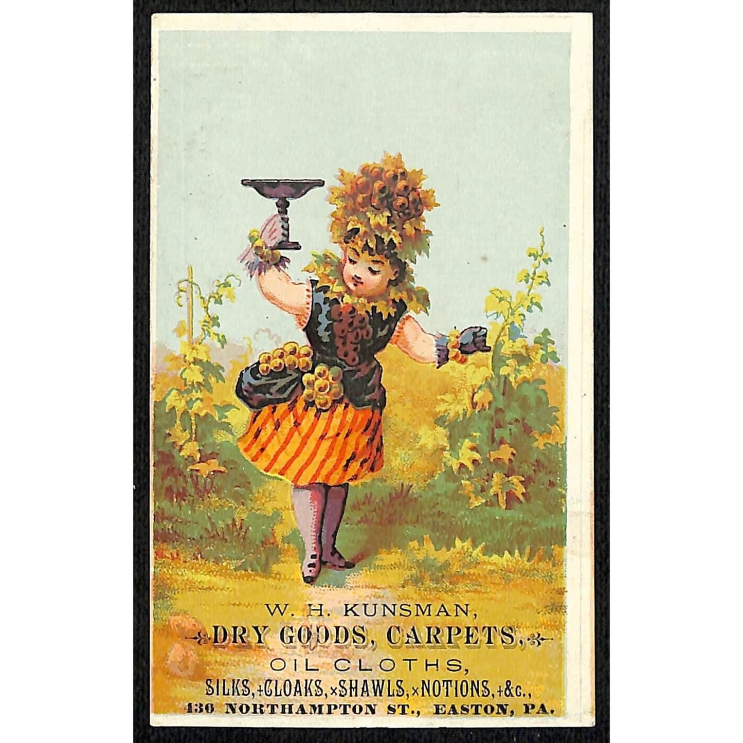 W.H Kunsman Easton, PA Dry Goods Victorian Trade Card Girl w/ Wine Glass