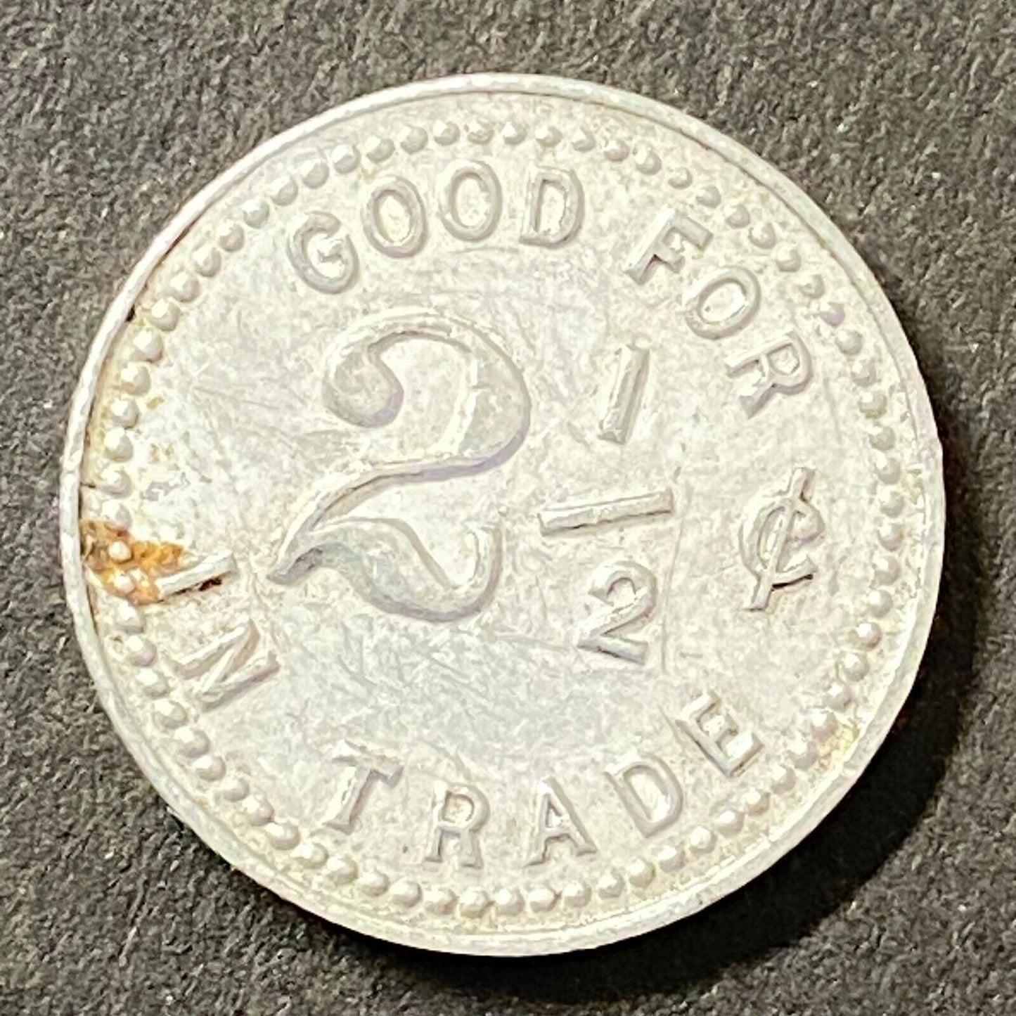 G.F.B. & T.H.C. G/F 2 1/2¢ Alum Trade Token 18mm Maverick