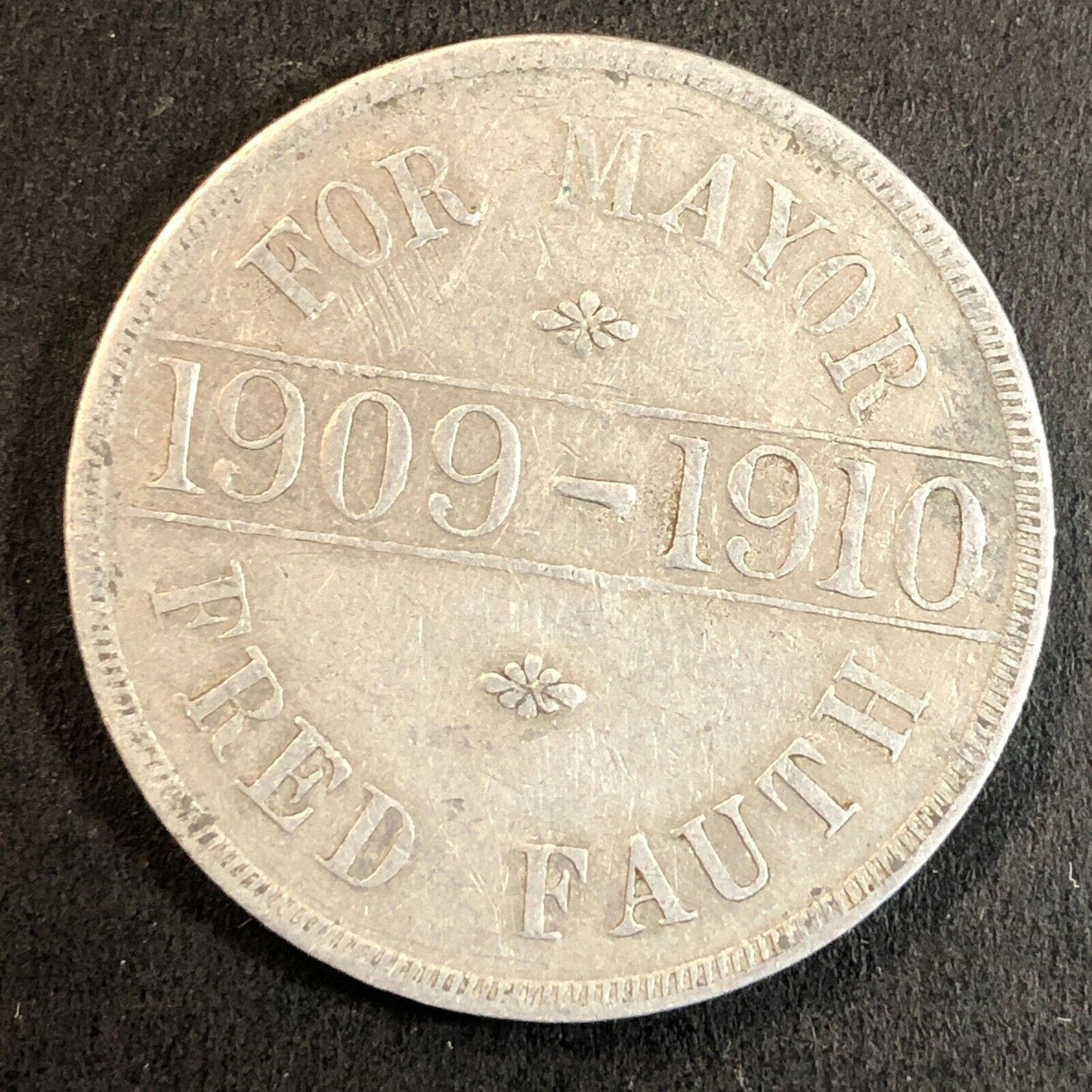 Aurora The City of Light & Prosperity Mayor Fred Fauth Alum Token 34mm 1909-10