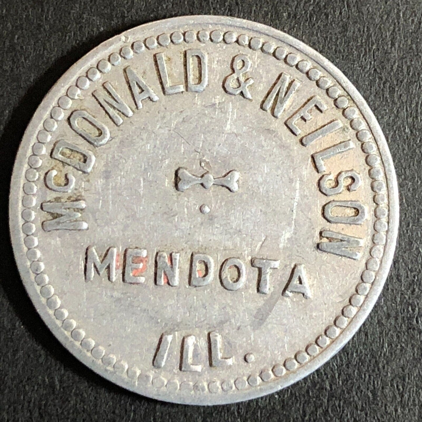McDonald & Neilson Mendota, IL Alum G/F 10c Trade Token 25mm c1955-65 VGC