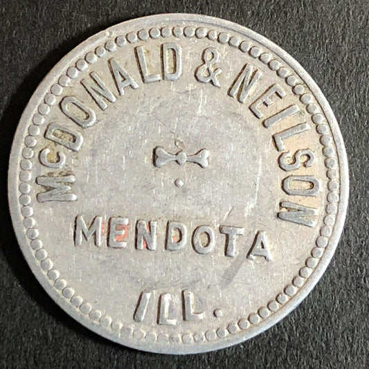 McDonald & Neilson Mendota, IL Alum G/F 10c Trade Token 25mm c1955-65 VGC