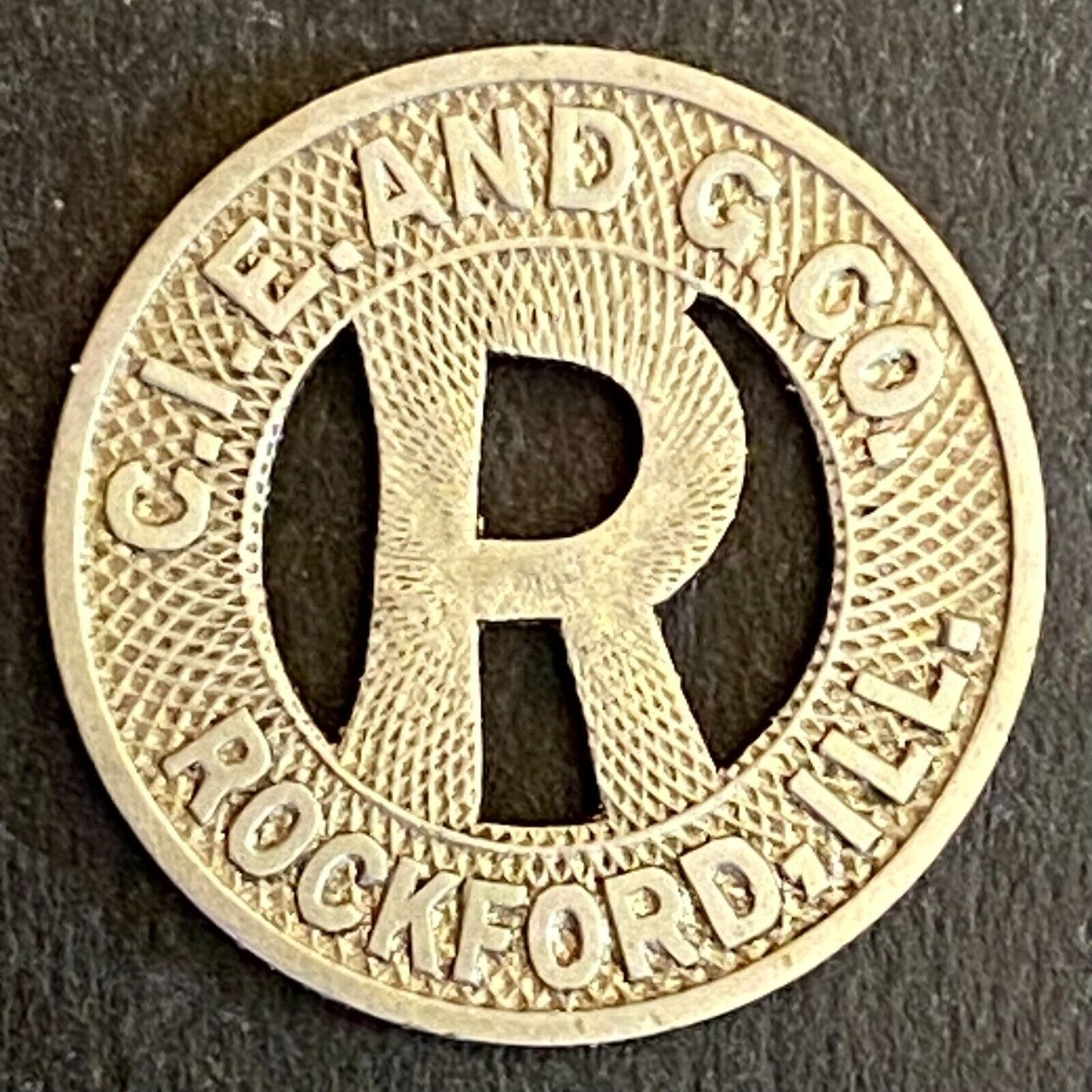 C.I.G. & G. Co. Rockford, IL G/F One City Fare Transit Token 16mm Scarce