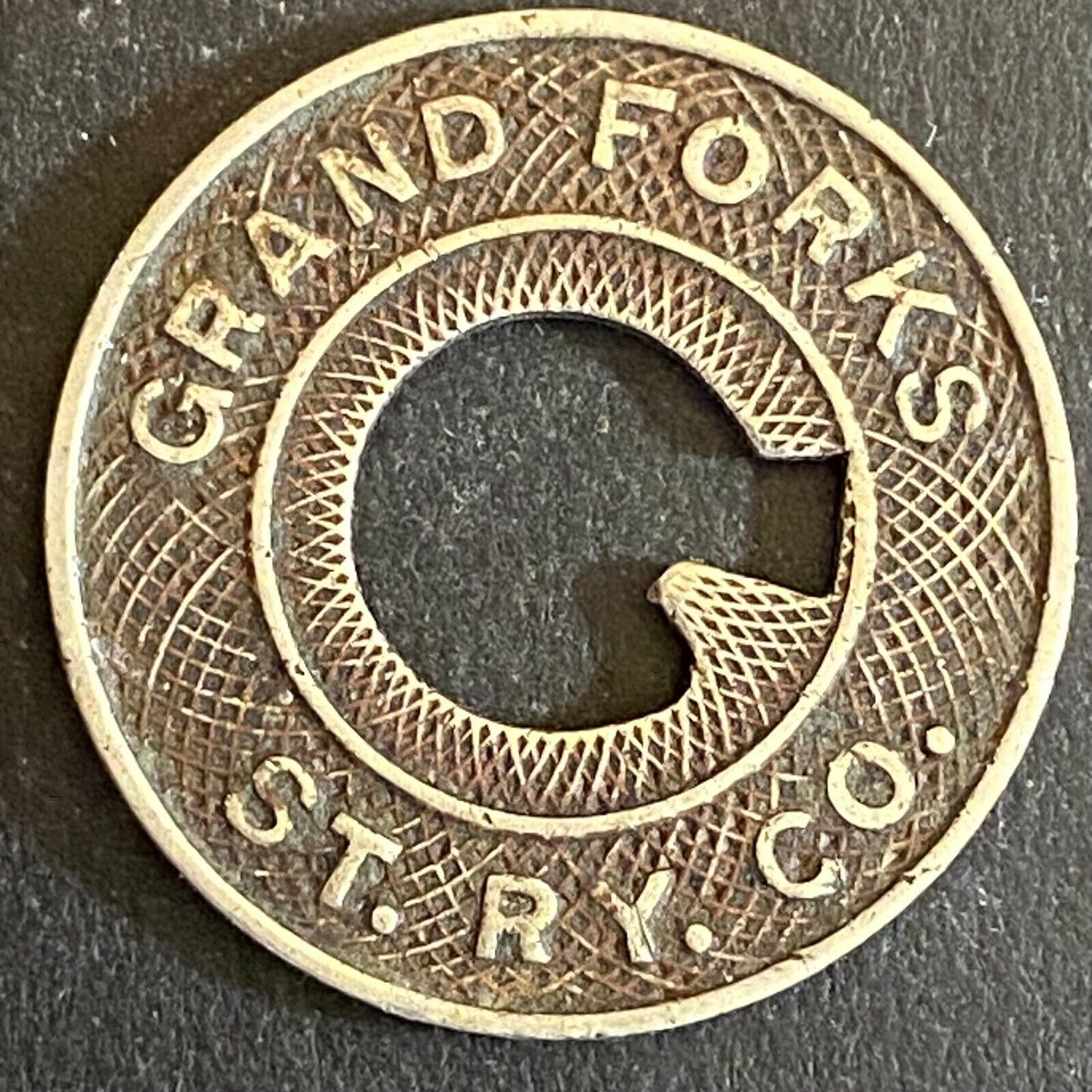 Grand Forks St. RY. Co. G/F One City Fare Transit Token 23mm Scarce