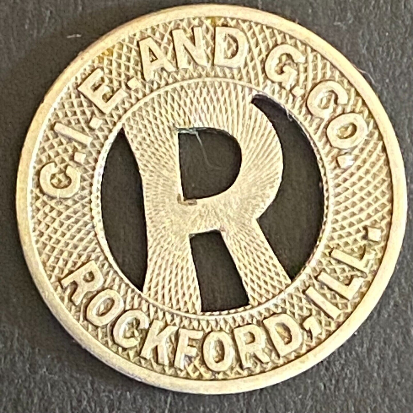 C.I.E. and G. Co. Rockford, IL G/F One City Fare Token 16mm - VGC