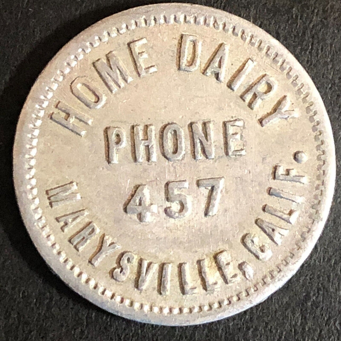 Home Dairy Marysville, CA Alum Trade Token G/F One Quart 24mm - c1920's-40