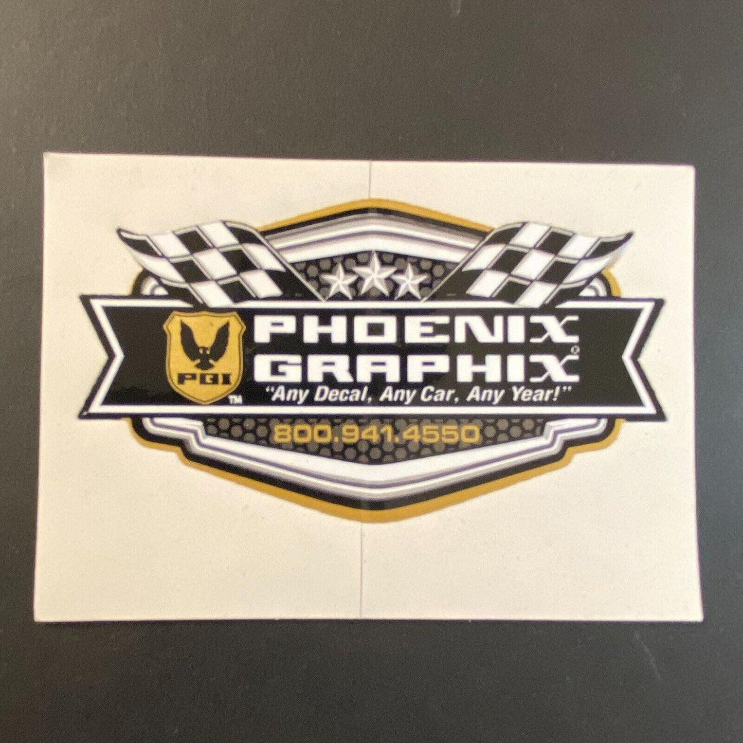 Phoenix Graphix PGI Checkered w/ Flags Sticker 1 3/4" x 3 1/4" c1993-2000