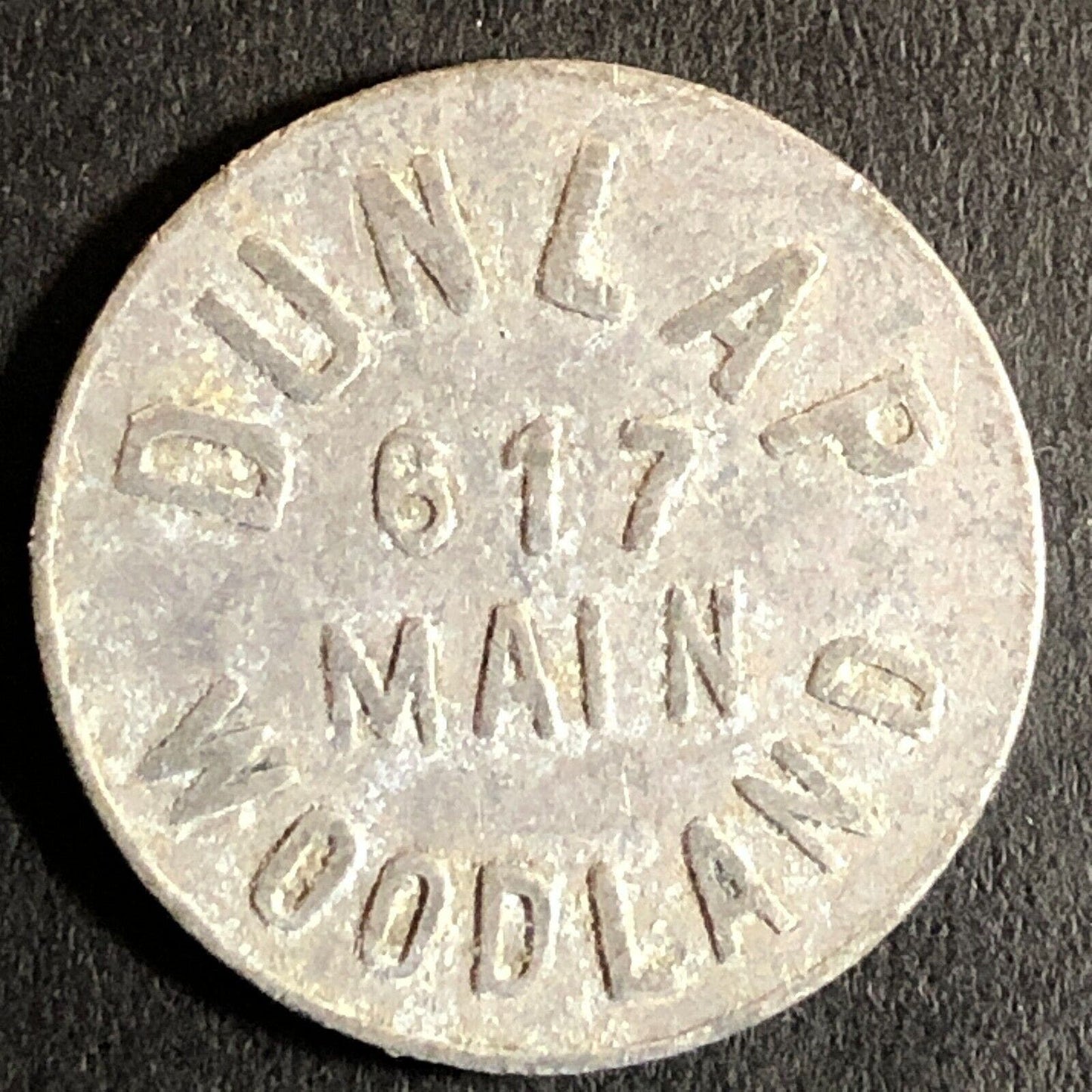 Dunlap (Cigars) 617 Main St. Woodland CA G/F 10c Alum Trade Token 21mm c1920's