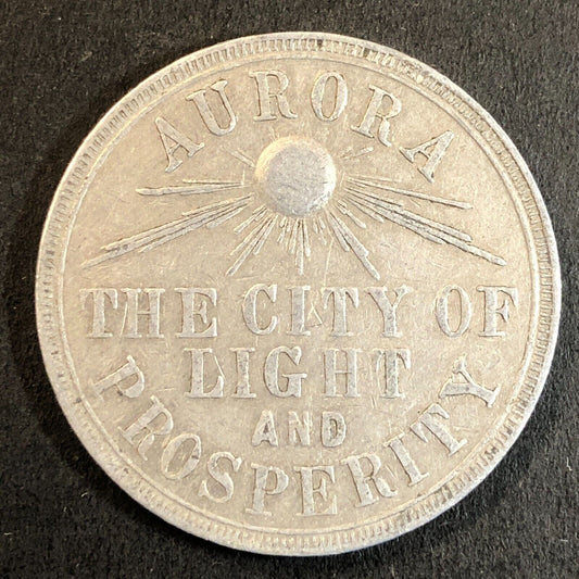 Aurora The City of Light & Prosperity Mayor Fred Fauth Alum Token 34mm 1909-10