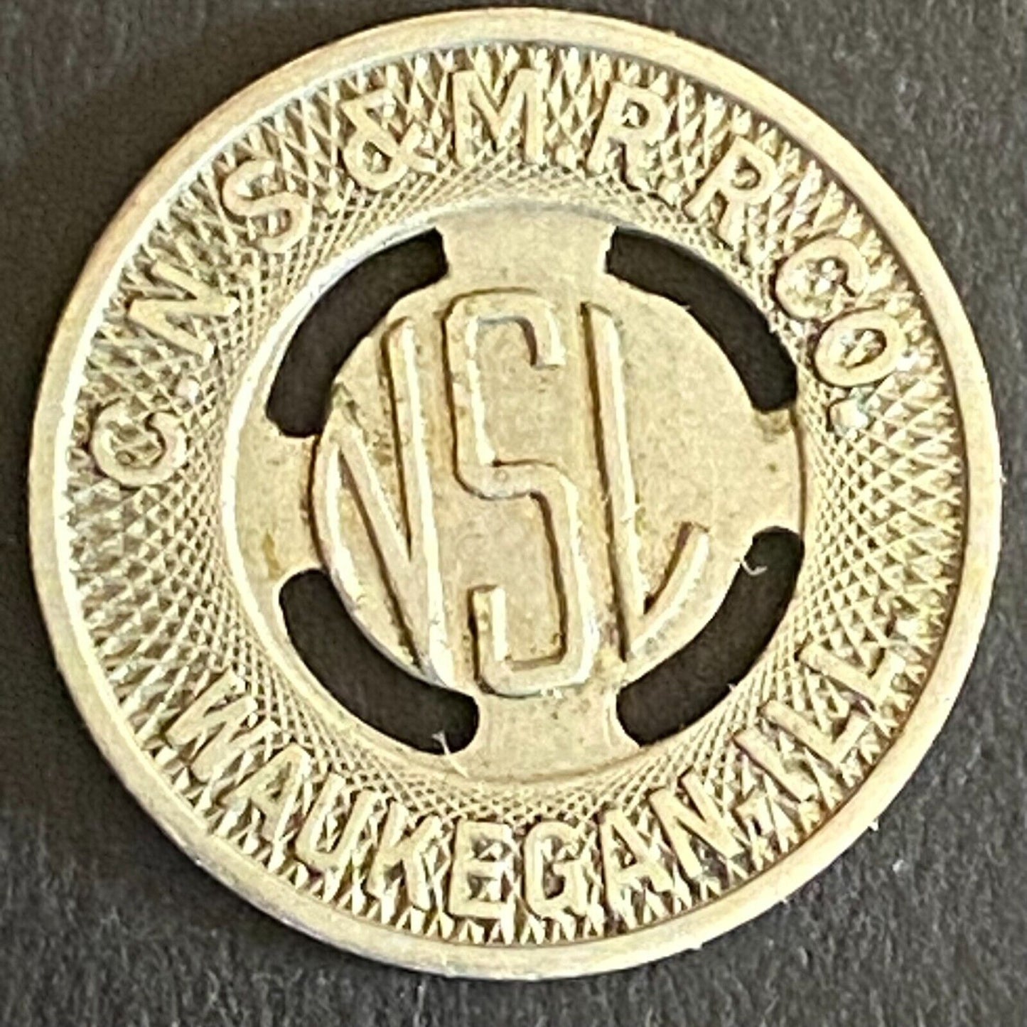 C.N.S. & M.R.R. Co. Waukegan, ILL G/F One Fare City Lines Transit Token 16mm