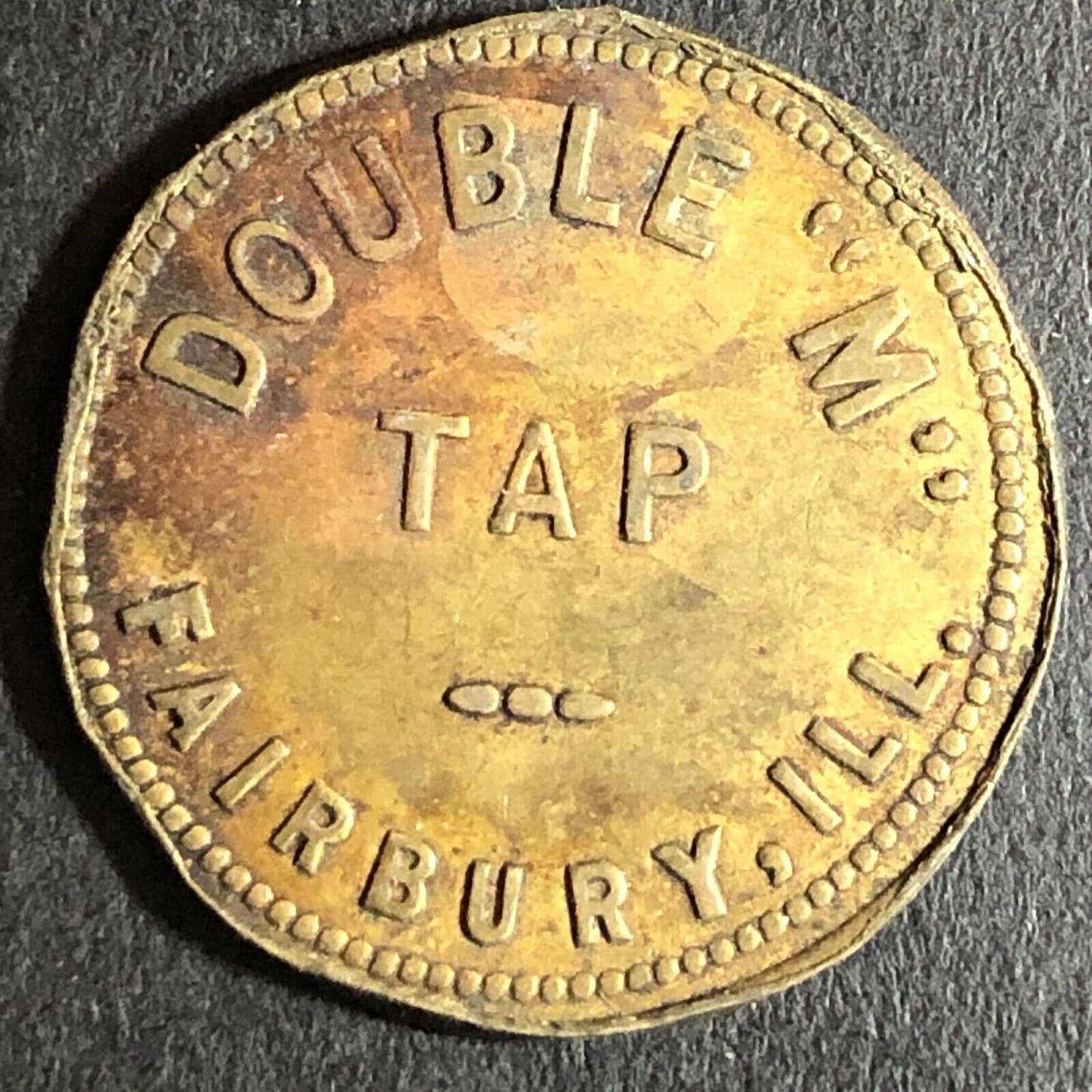 Fairbury, IL Double "M" Tap G/F 10c Trade Token 24mm (Opened 1954) Scarce