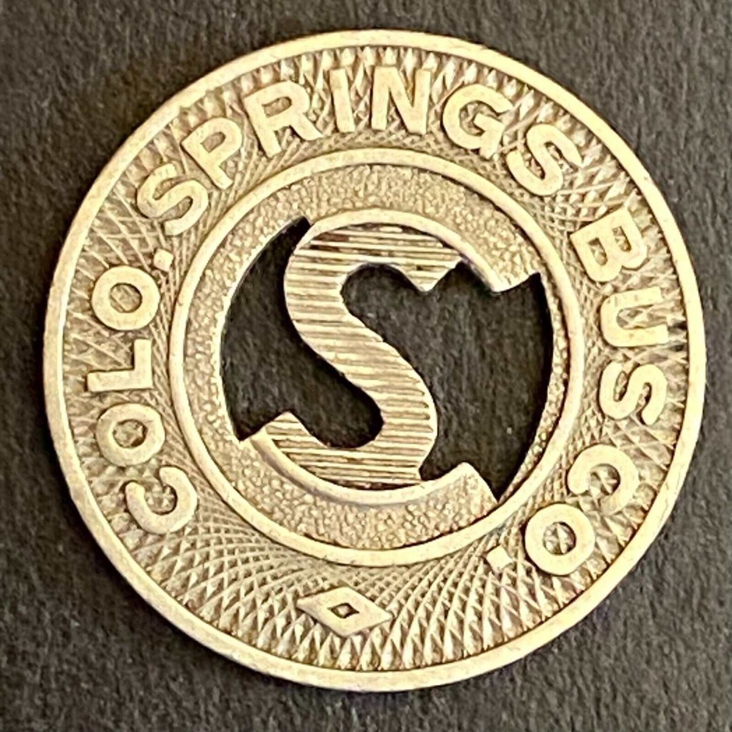 Colo. Springs Bus Co. G/F One Fare Transit Token 16mm (#2)