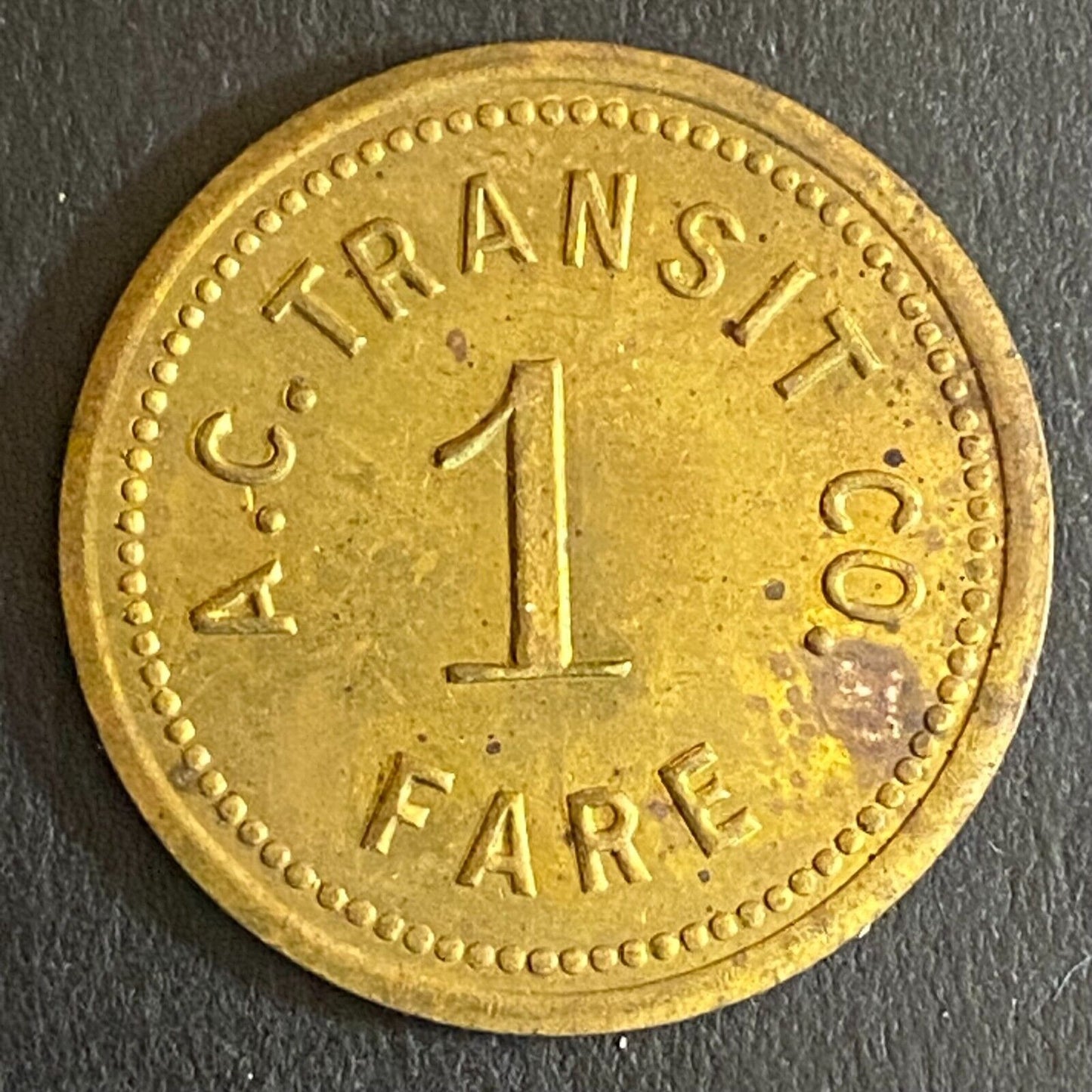 A.C. Transit Co. (Arkansas City, KS) Brass "1 Fare" Transit Token 23mm Scarce