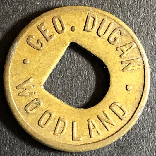 Geo. Dugan Woodland (CA Cigars Billiards) G/F 5c 21mm Trade Token c1920s Brass