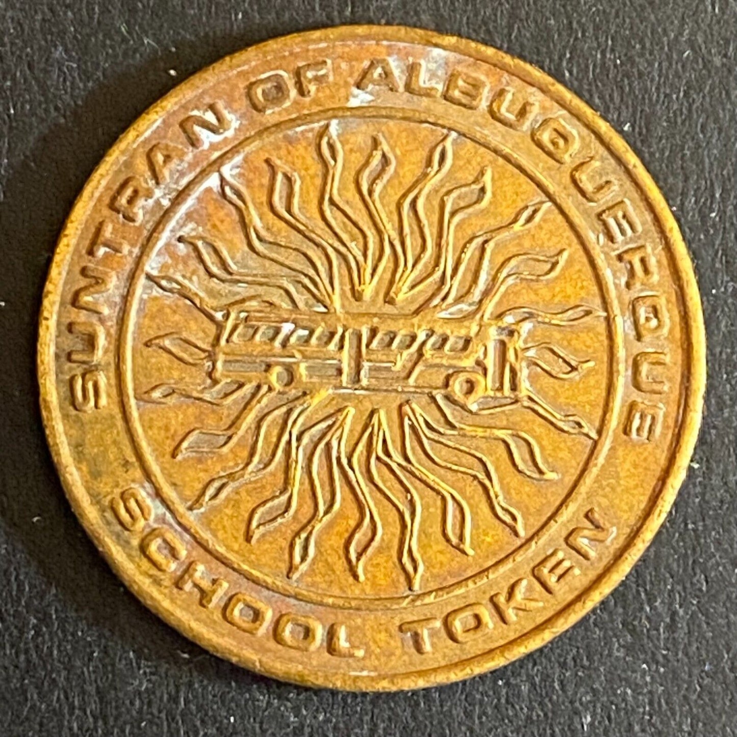 Suntran of Albuquerque School Bus Token Transit Radiant Sun 22mm