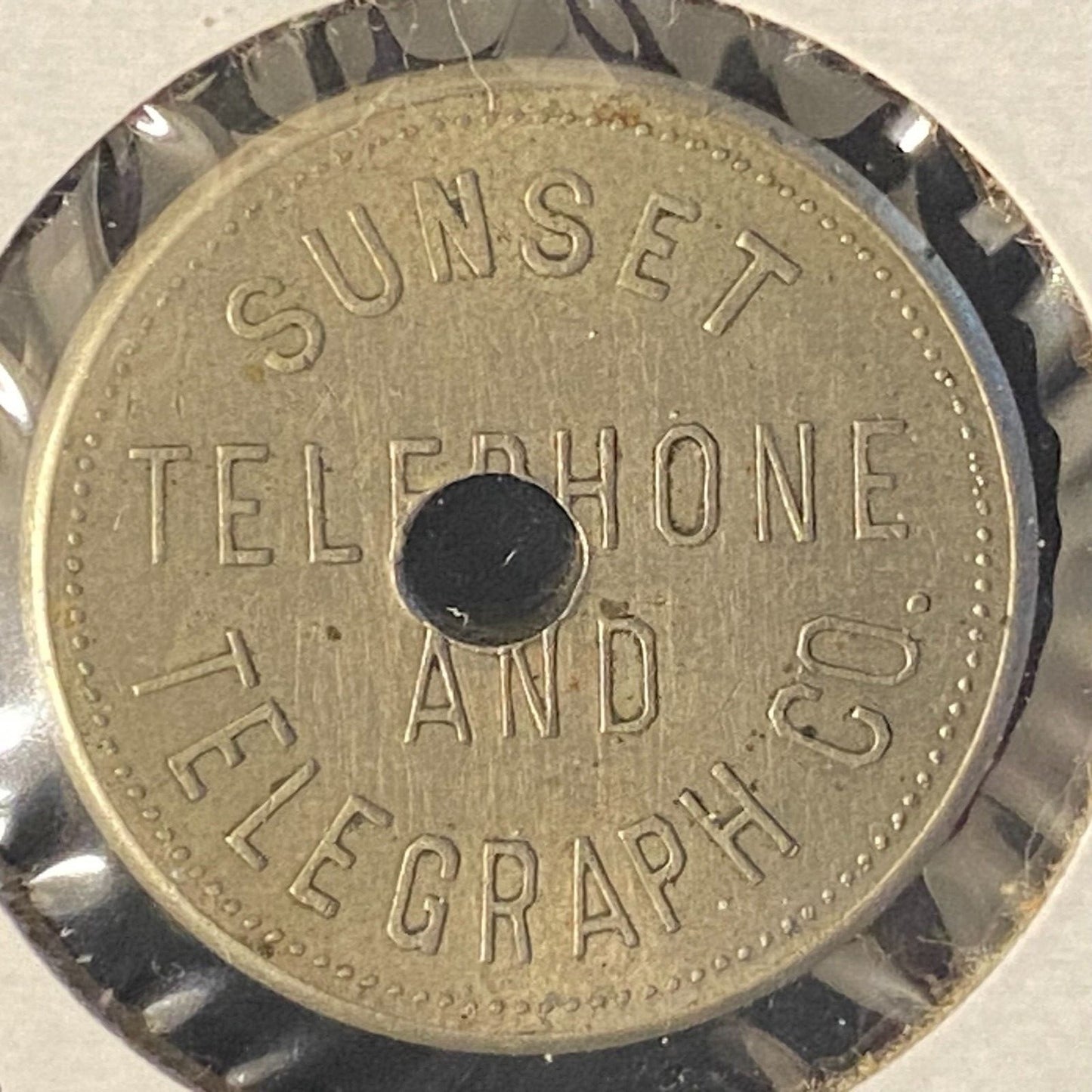 Sunset Telephone & Telegraph San Francisco, CA "One Switch" WM 21mm 5.0g Holed