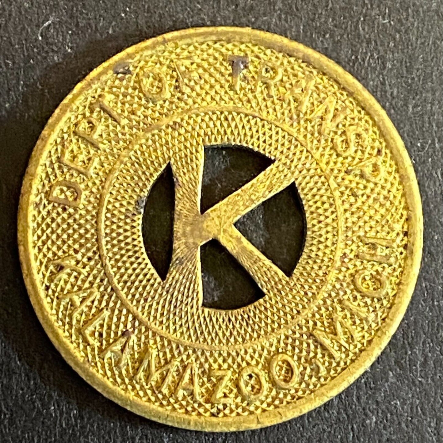 Dept of Transp Kalamazoo, Mich G/F One Fare Transit Token "K" 23mm Scarce