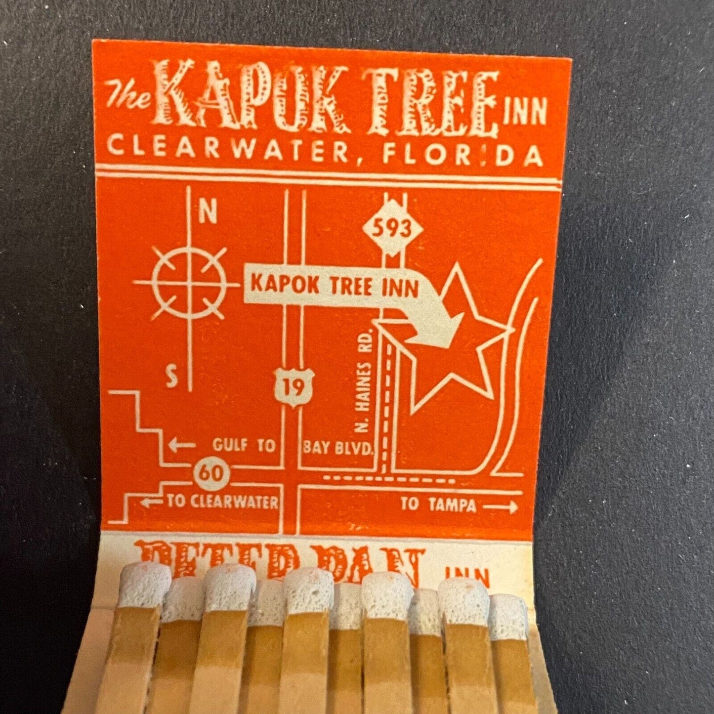 Kapok Tree Inn Clearwater c1950's-60s Full Matchbook w/ Peel Off Paper Strip