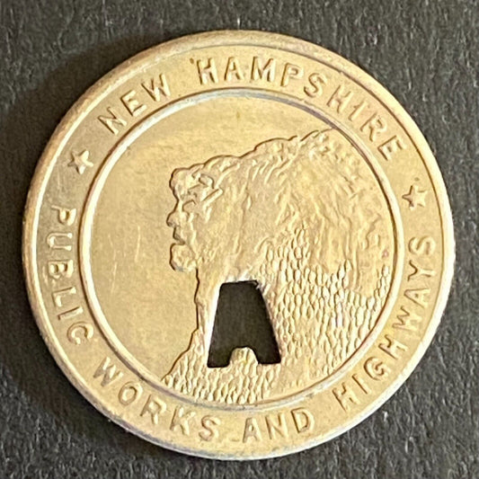 New Hampshire Public Works and Highways Transit Token w/ "A" Punch Out 16mm (#3)