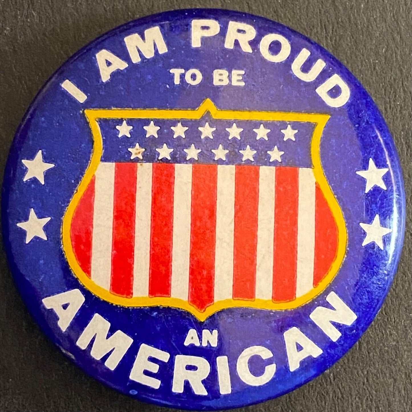 "I am Proud to be an American" Shield Flag Steel Pinback 1 1/8" c1940's-60's VGC