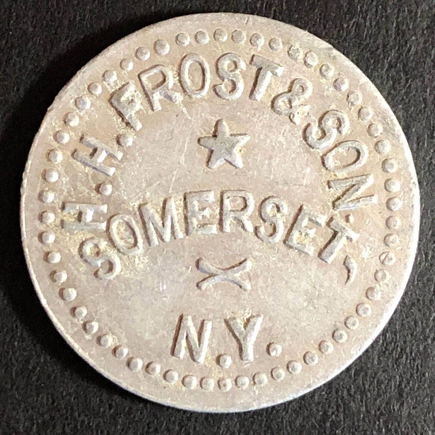 H.H. Frost & Son Somerset, NY G/F 10c Alum Trade Token c1920's-30's 25mm