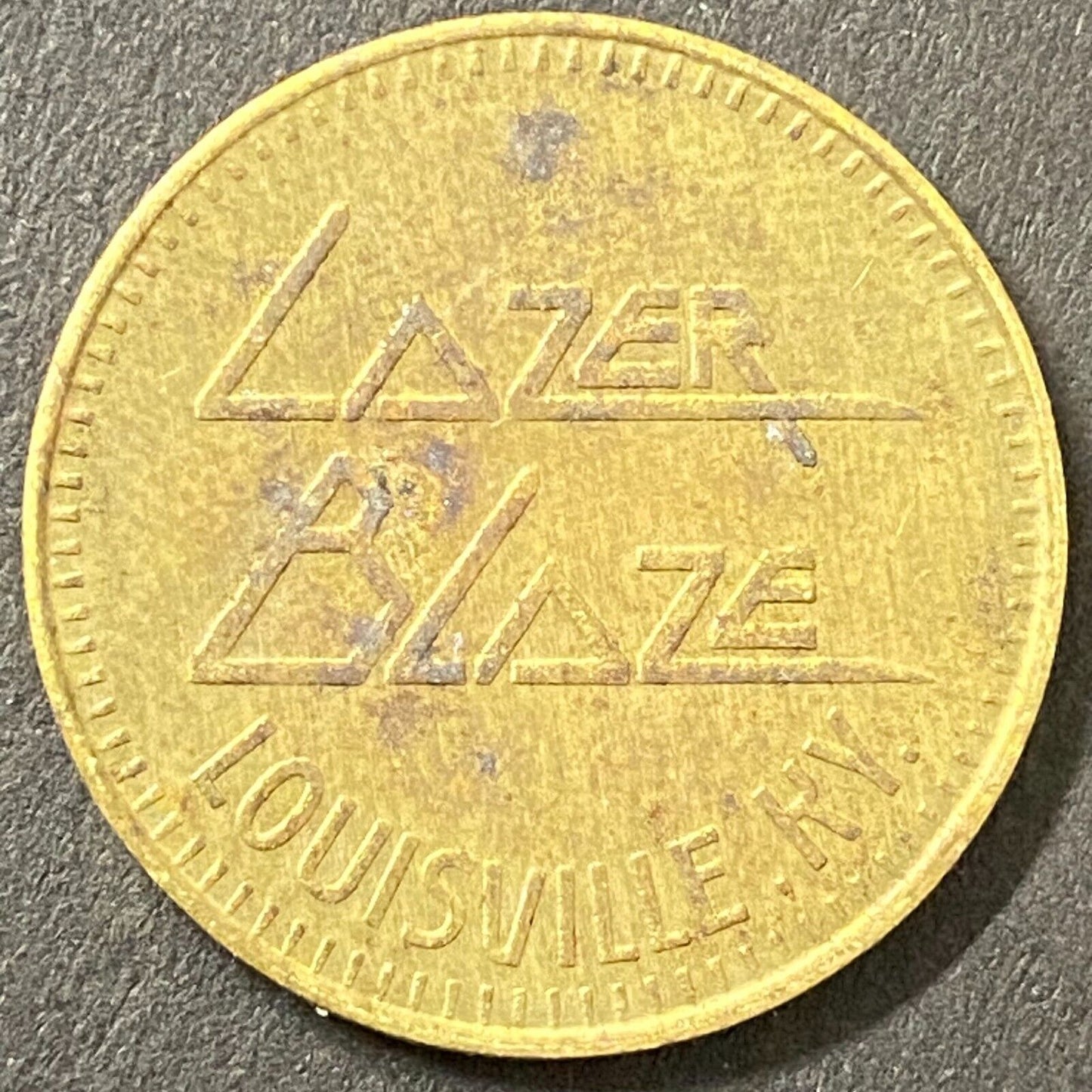 Lazer Blaze Louisville, KY Brass Arcade Amusement Token 25mm (#1)