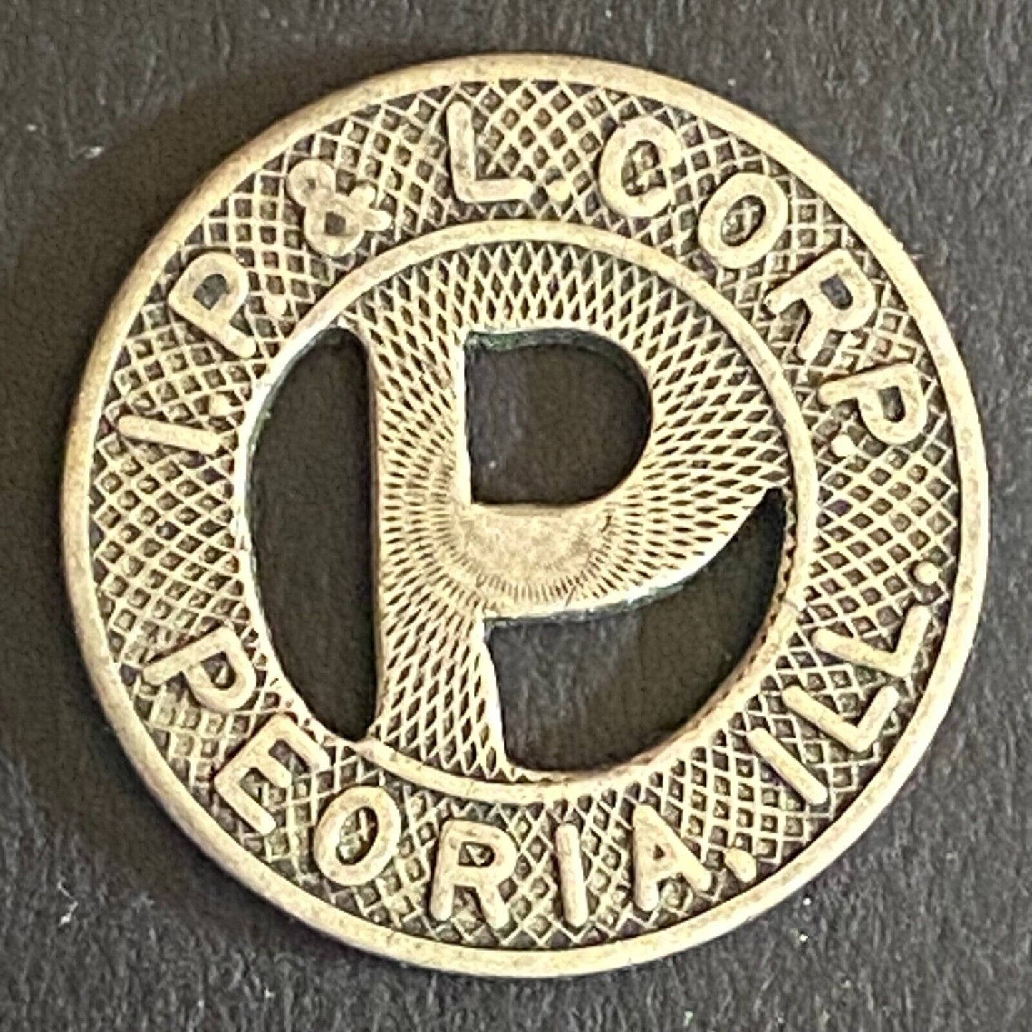 I.P. & L. Corp. Peoria, ILL G/F One Fare Transit Token - 16mm